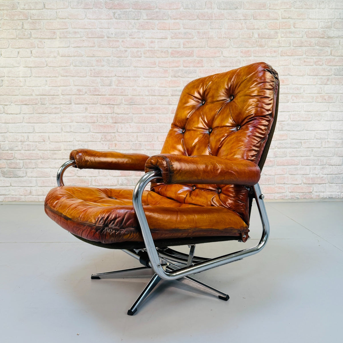 1970s Vintage Danish Tan Leather Swivel Recliner Armchair Chrome Frame
