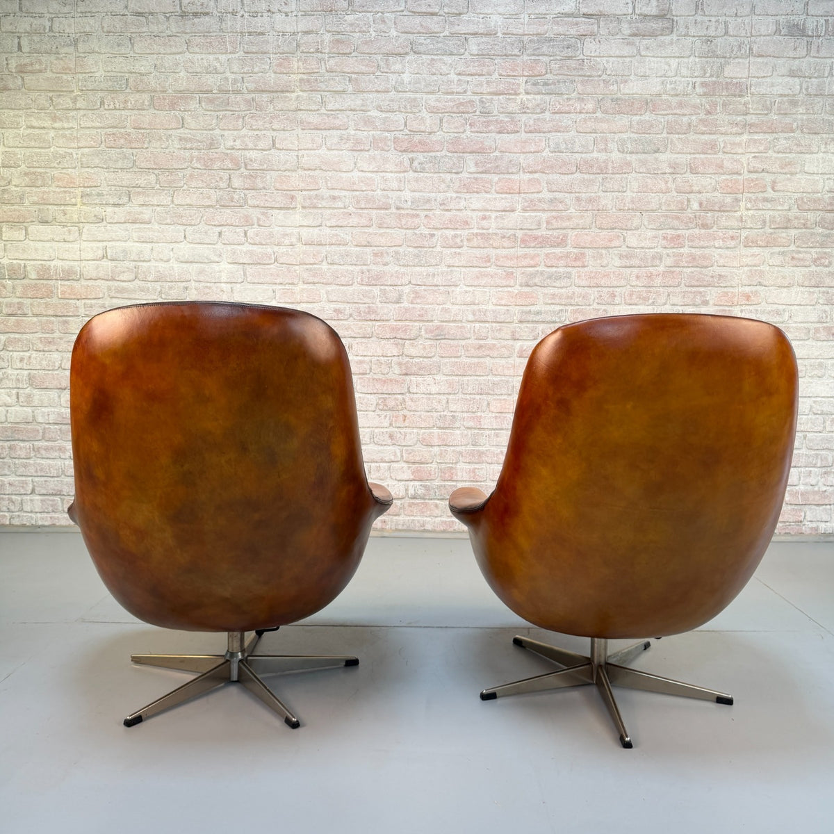 Vintage 1970s H.W. Klein Danish Tan Leather Swivel Egg Chairs & Footstool