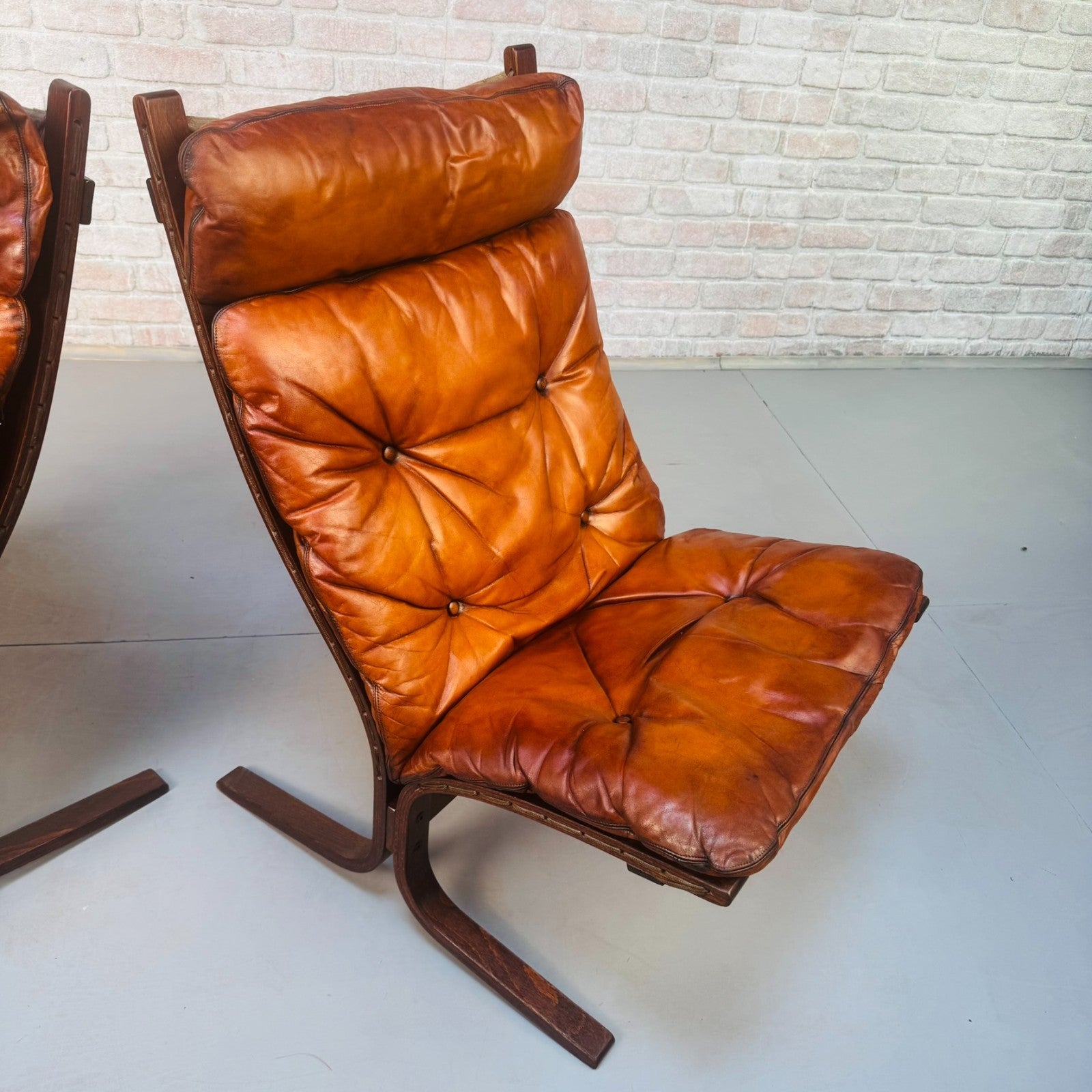 Pair of 1970s Westnofa Siesta High Back Lounge Chairs by Ingmar Relling
