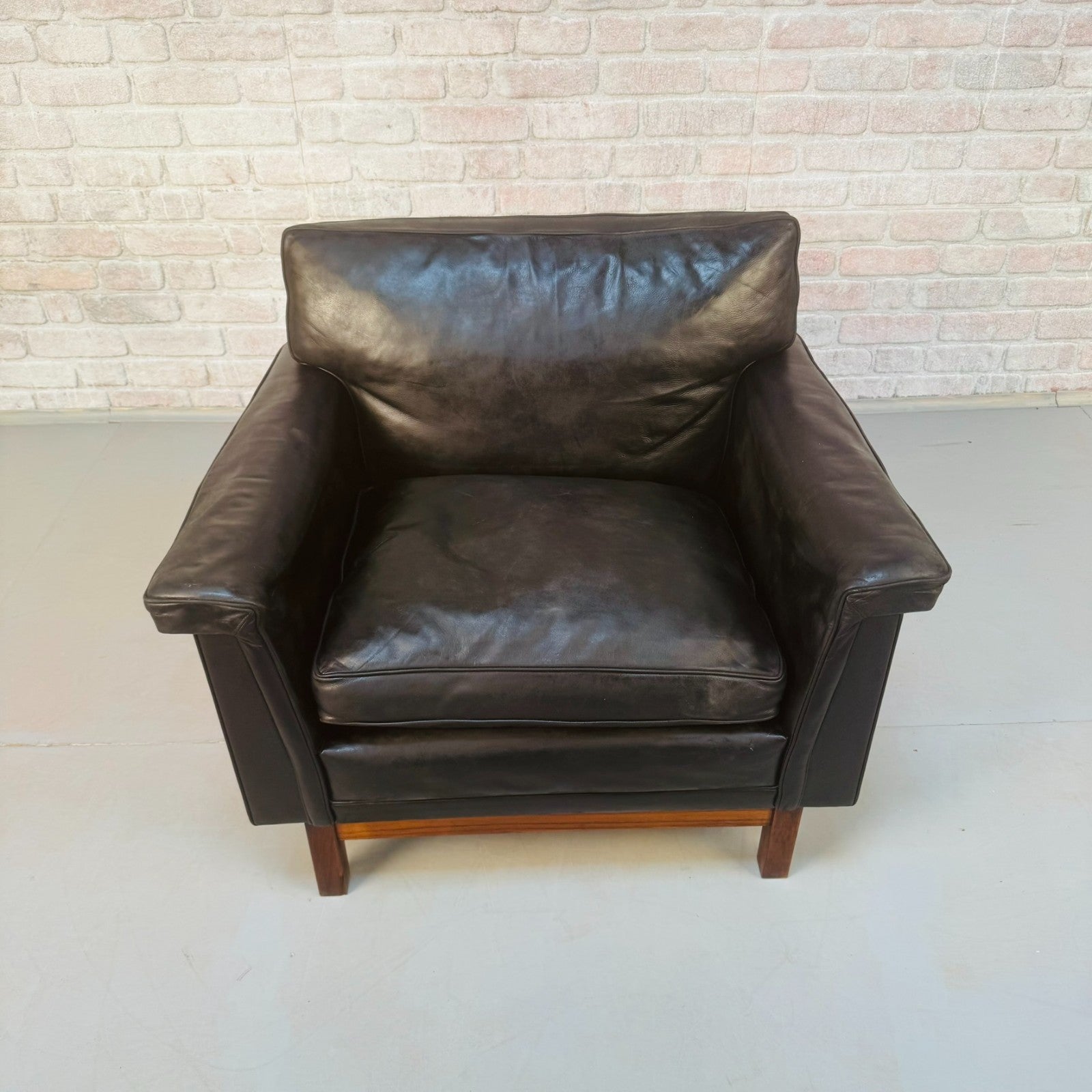 Vintage 1960s Swedish Black Leather Armchair – Rosewood Base