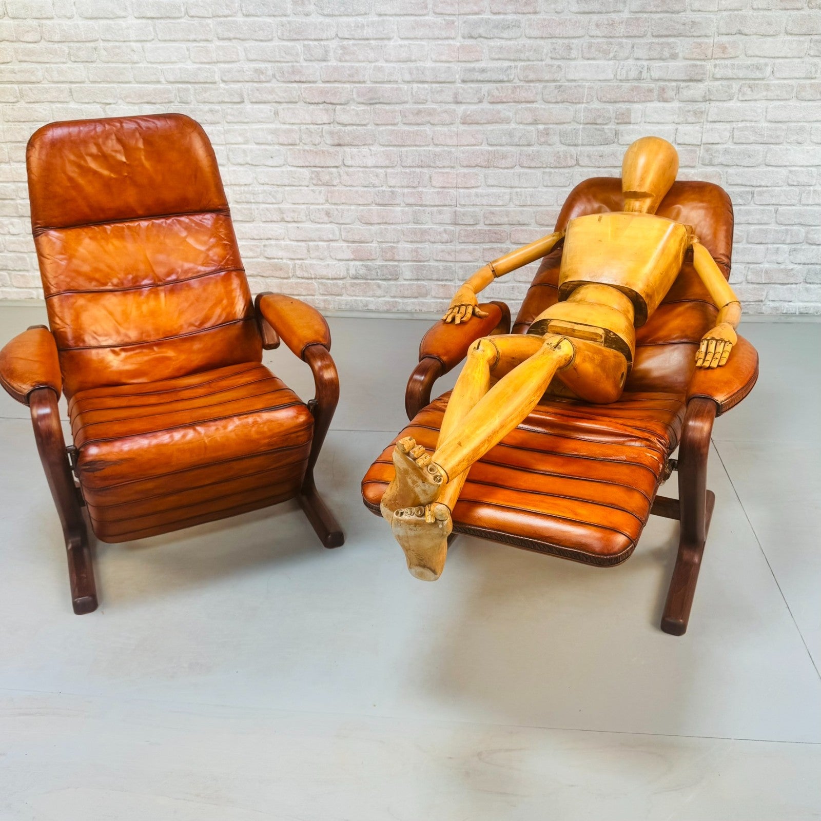 Pair of Vintage Danish Zero Gravity Reclining Tan Leather Armchairs Teak Frame