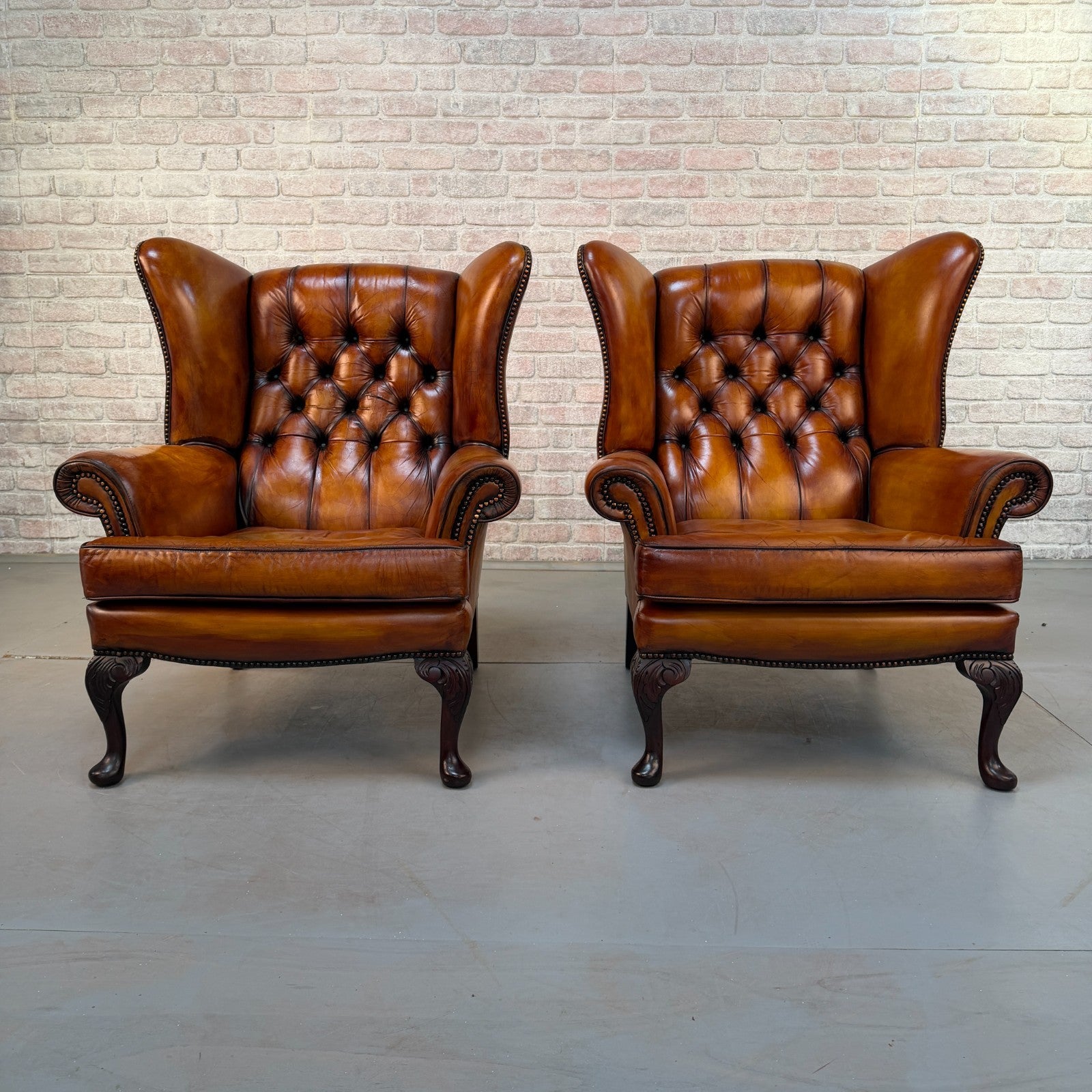 Pair of Vintage English Chesterfield Tan Hand-Dyed Leather Wingback Armchairs