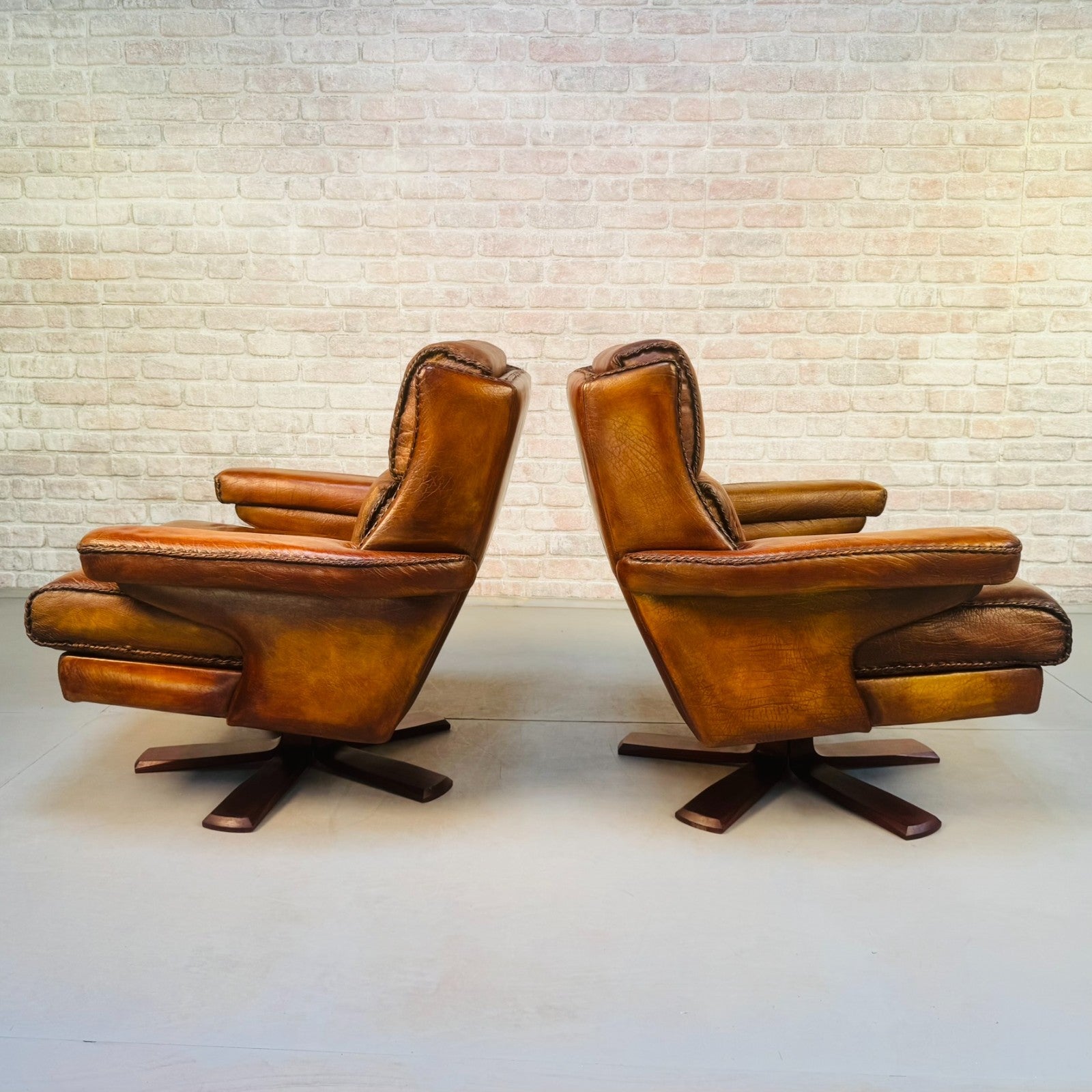 Pair Danish Swivel Chairs Tan Bison Leather Hand Plaited Lounge Chairs
