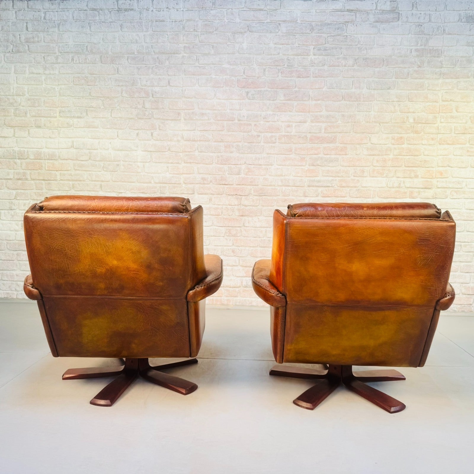 Pair Danish Swivel Chairs Tan Bison Leather Hand Plaited Lounge Chairs
