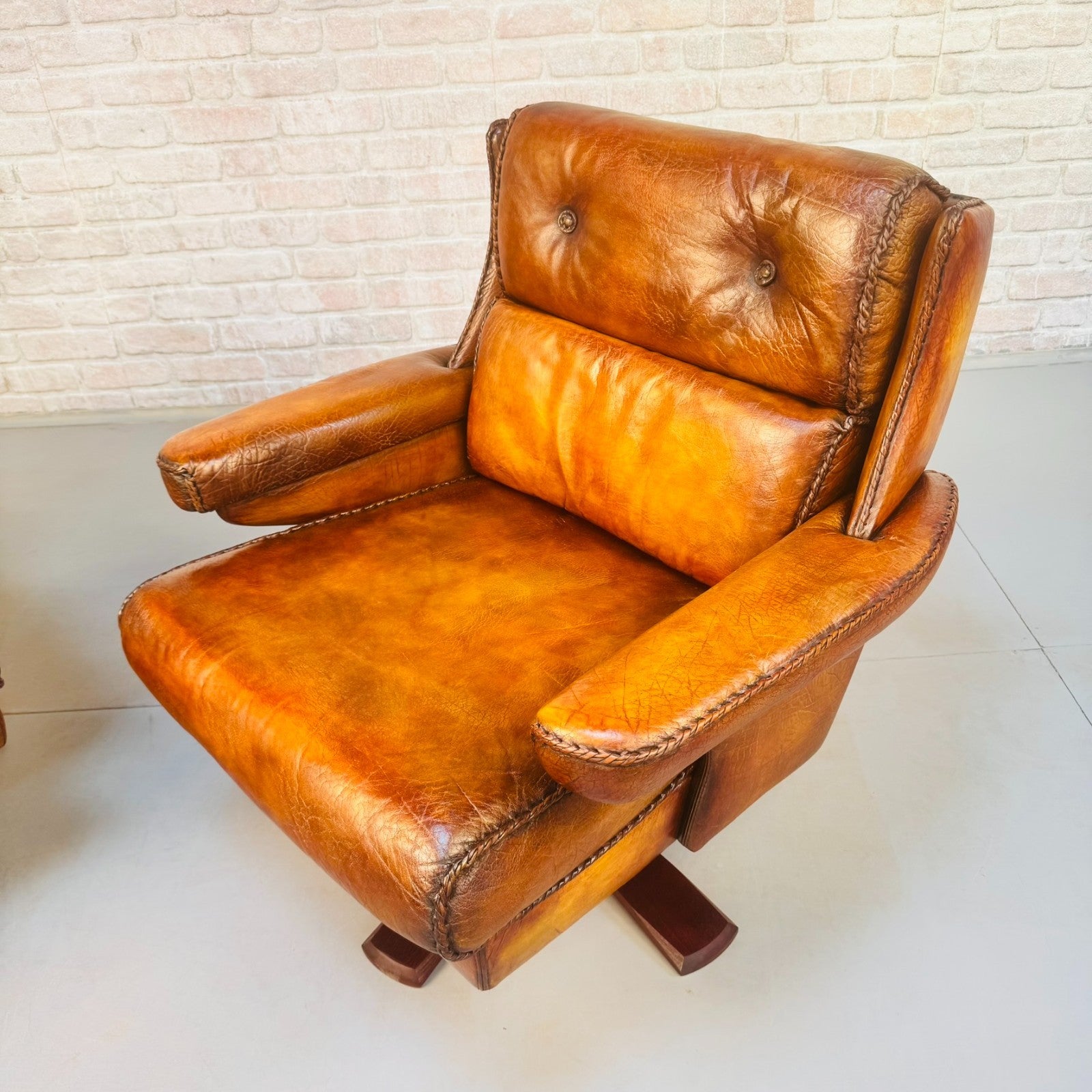 Pair Danish Swivel Chairs Tan Bison Leather Hand Plaited Lounge Chairs
