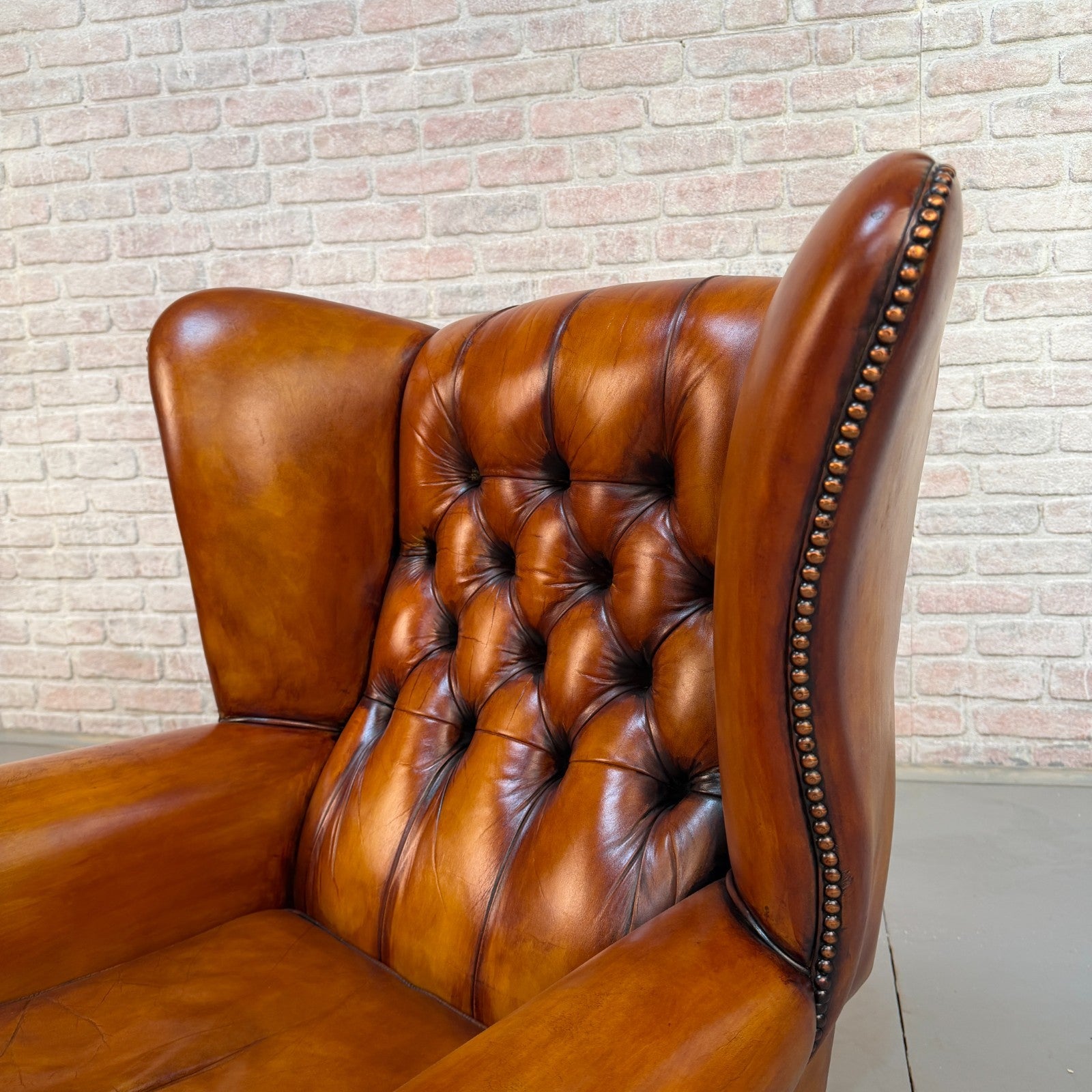 Pair of Vintage English Chesterfield Tan Hand-Dyed Leather Wingback Armchairs