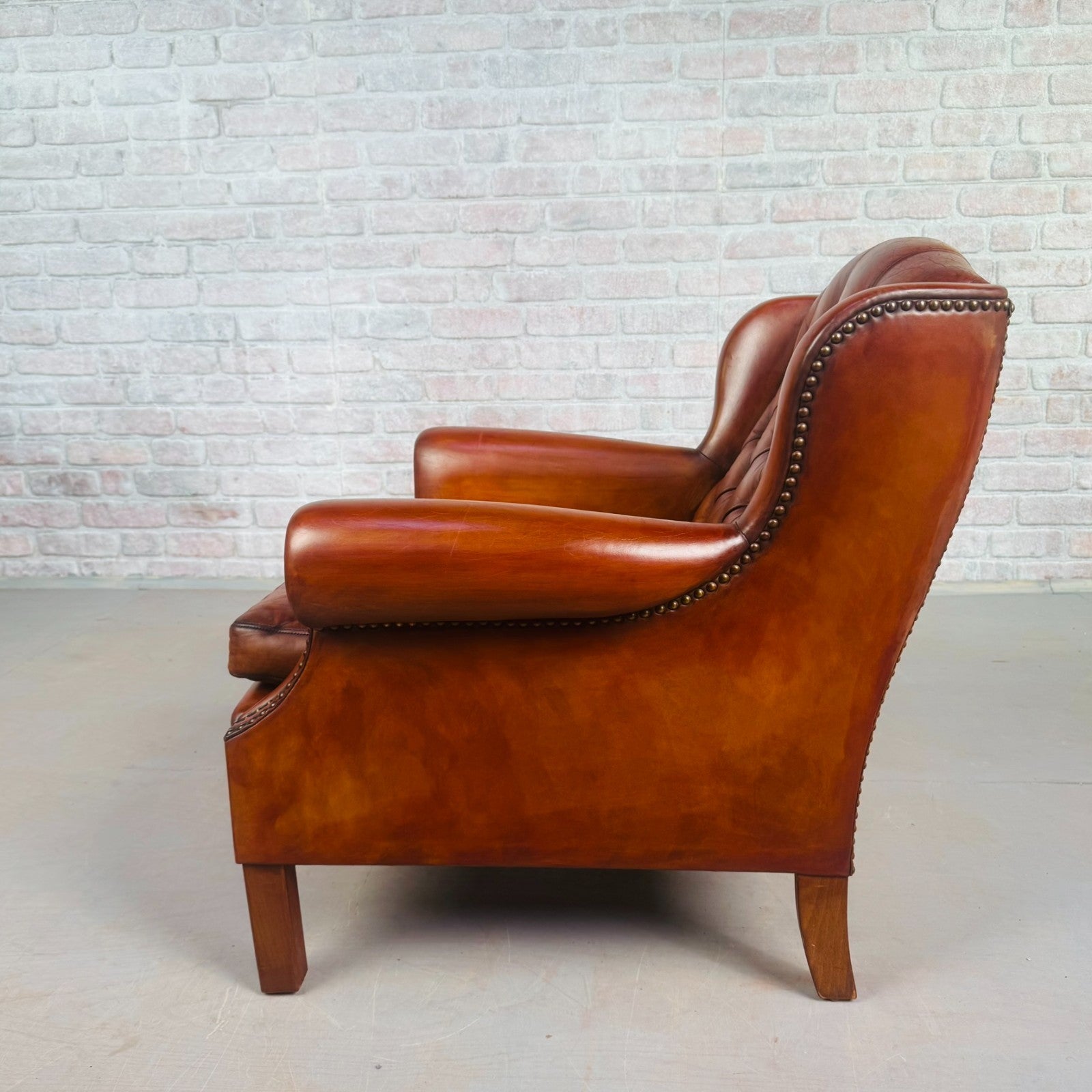 Neat Vintage Danish Tan Leather Armchair