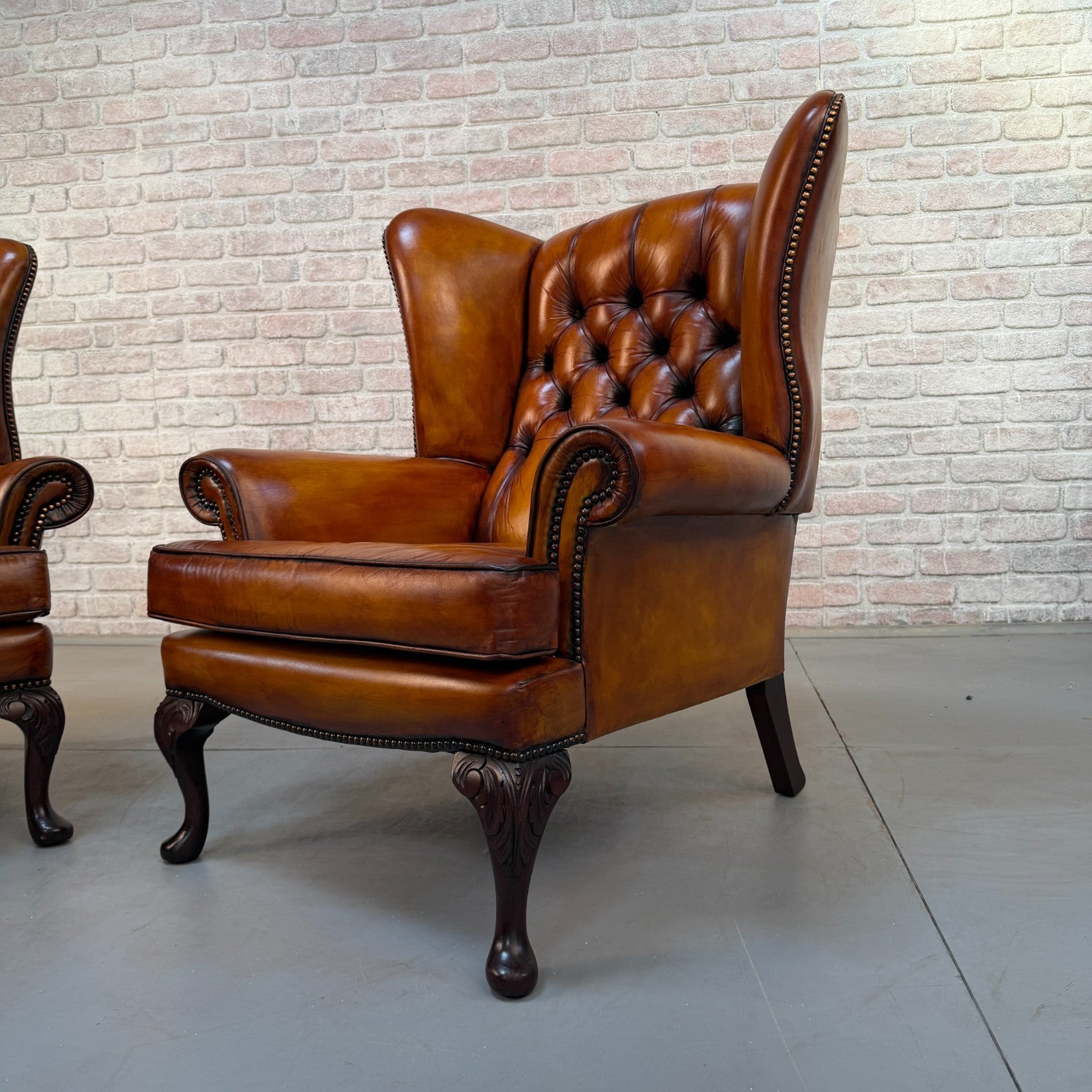 Pair of Vintage English Chesterfield Tan Hand-Dyed Leather Wingback Armchairs