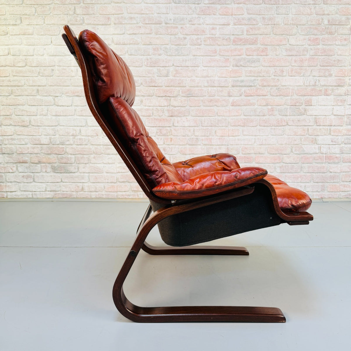 1970s Vintage Scandinavian Cognac Leather Cantilever Armchair Bentwood Frame