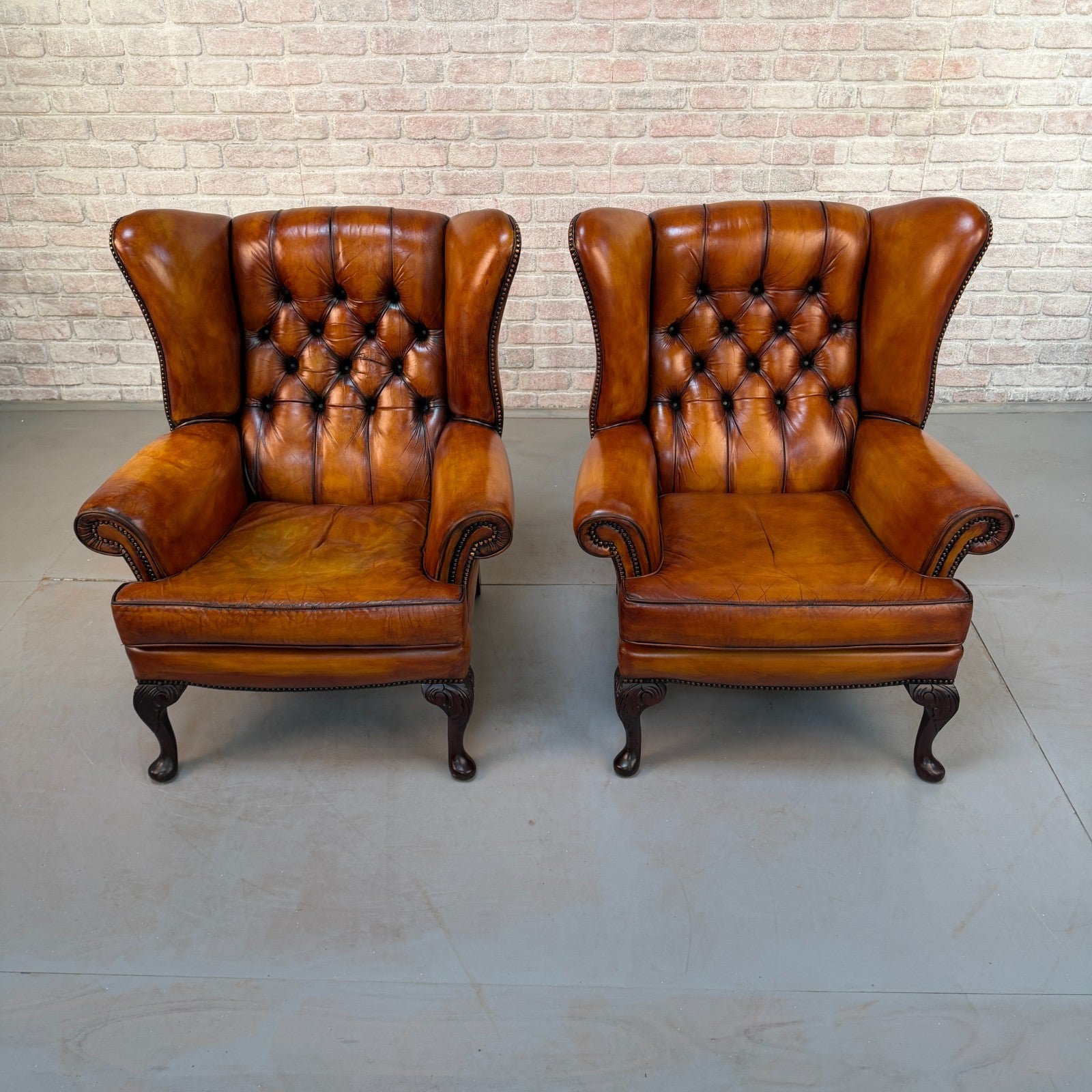 Pair of Vintage English Chesterfield Tan Hand-Dyed Leather Wingback Armchairs