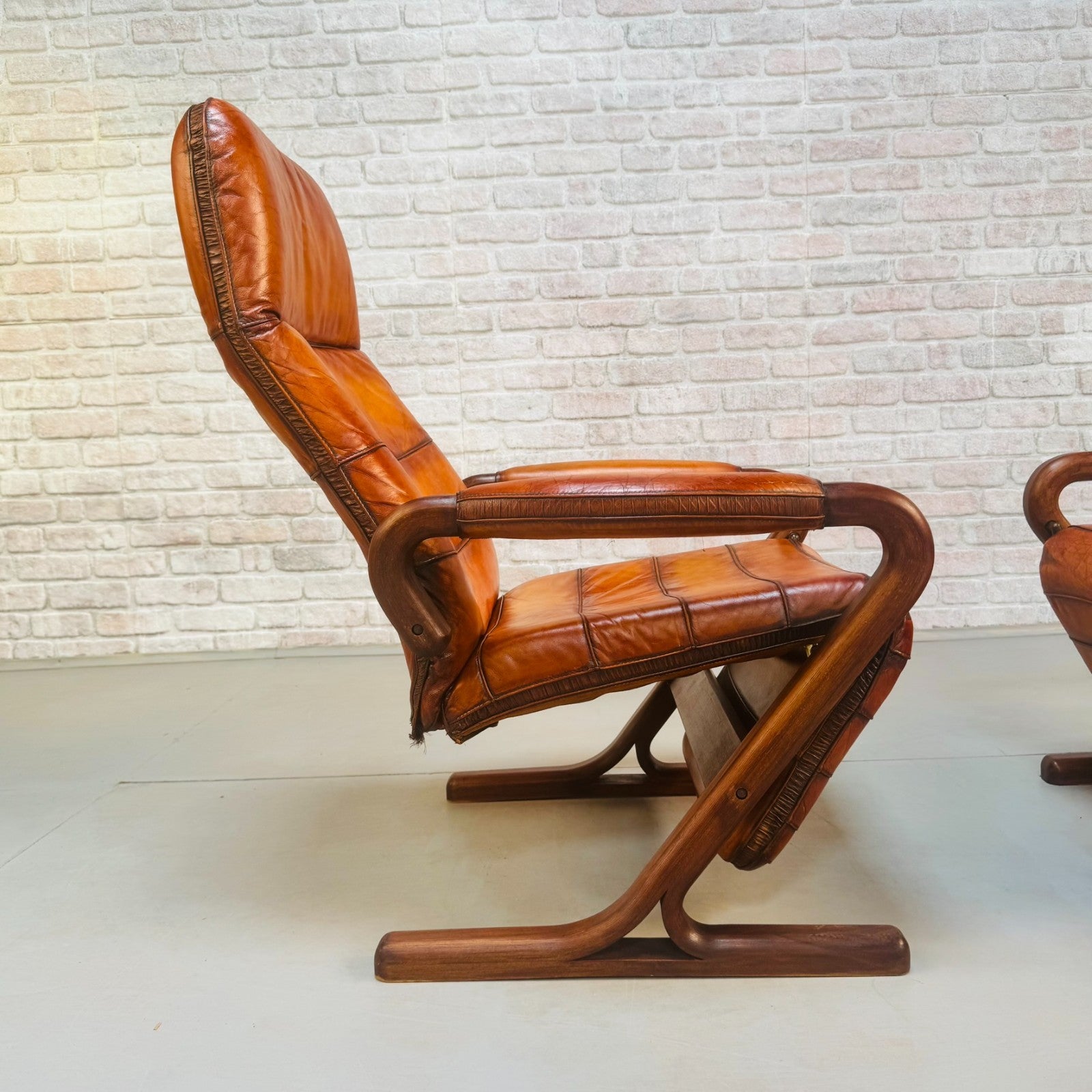 Pair of Vintage Danish Zero Gravity Reclining Tan Leather Armchairs Teak Frame