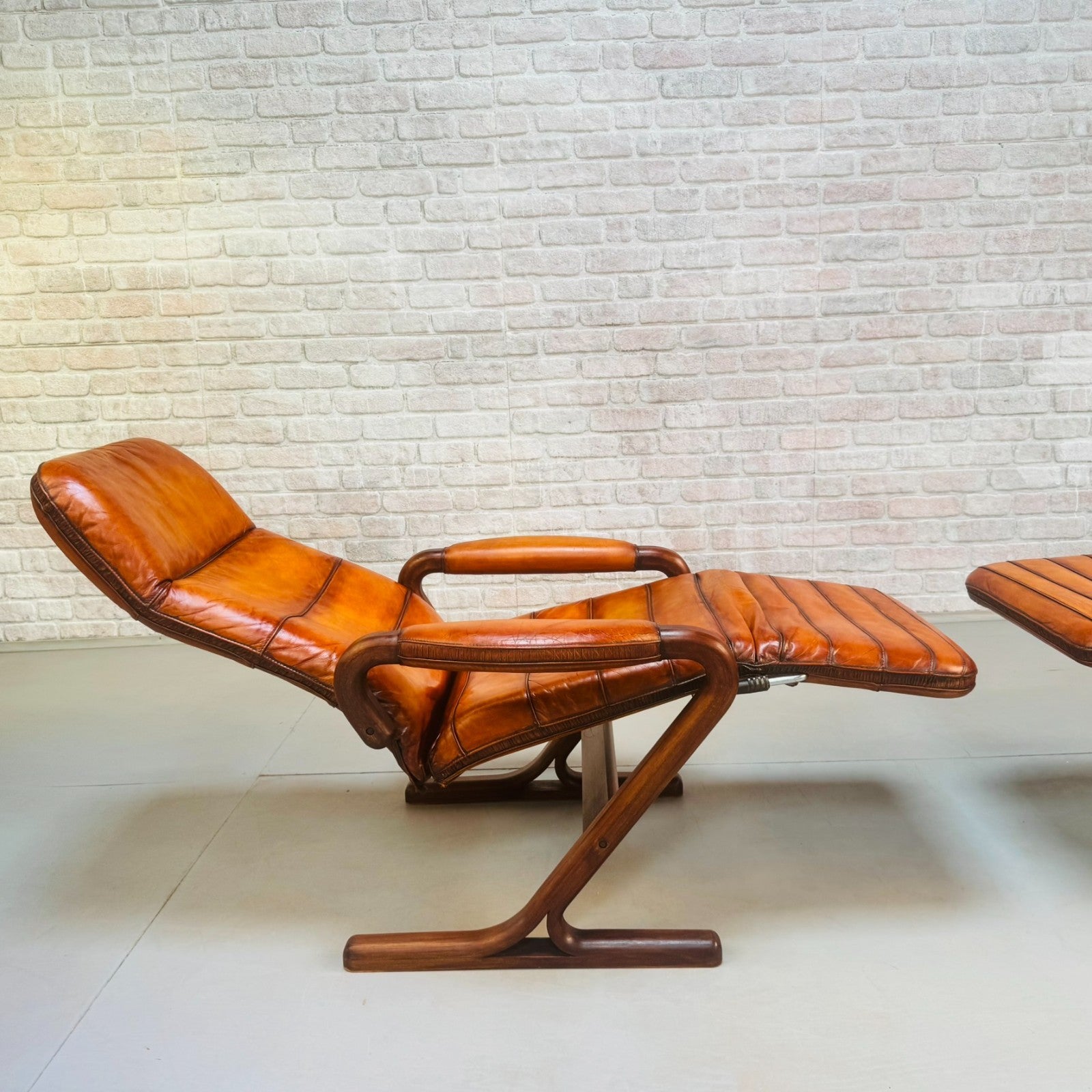 Pair of Vintage Danish Zero Gravity Reclining Tan Leather Armchairs Teak Frame