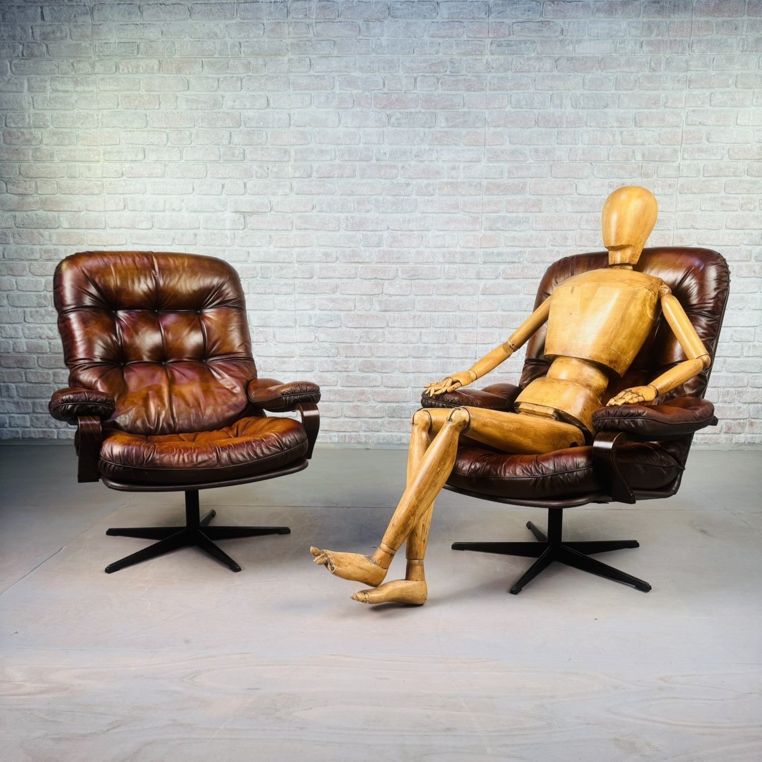 Pair of Vintage Danish Tan Leather Swivel Chairs  Stylish