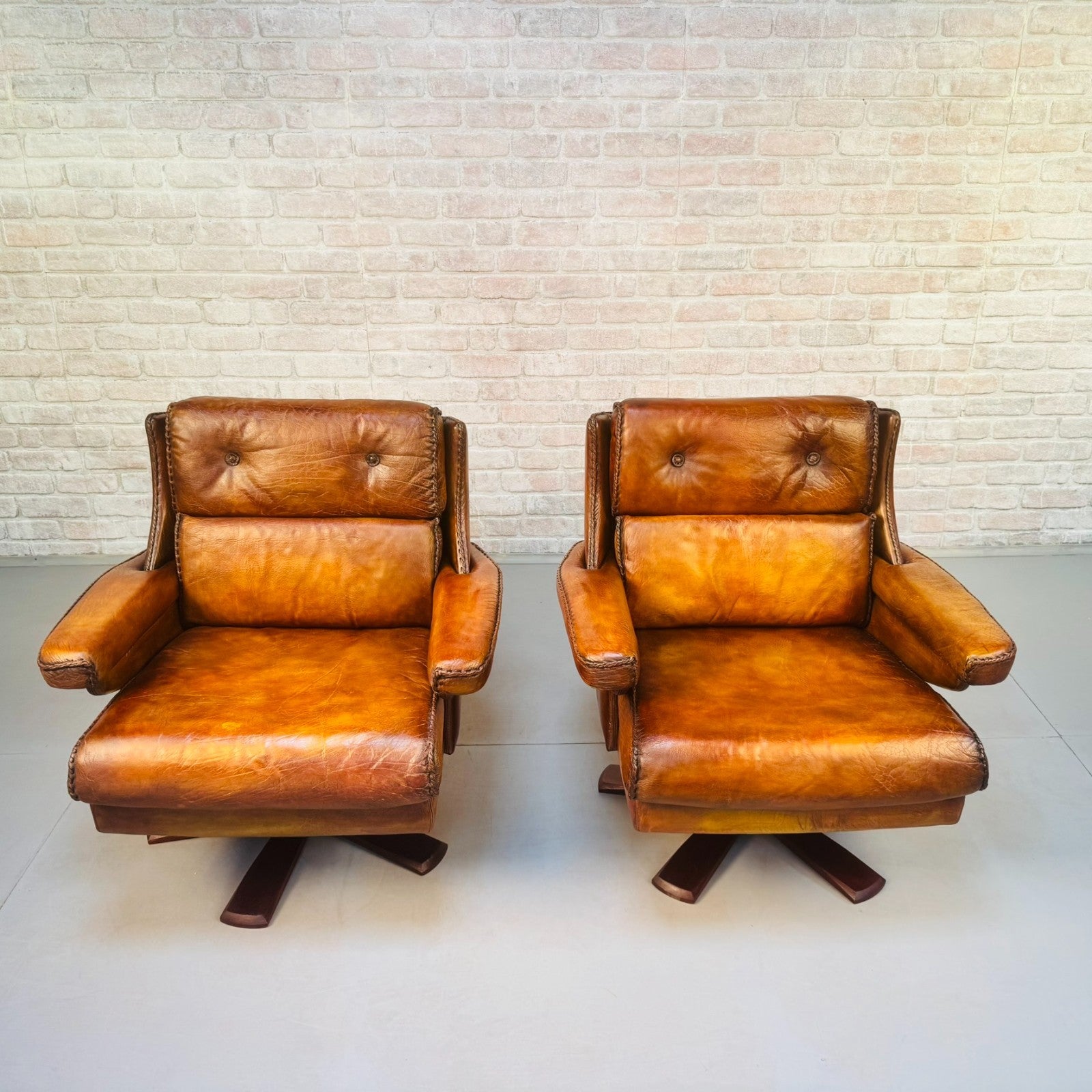 Pair Danish Swivel Chairs Tan Bison Leather Hand Plaited Lounge Chairs