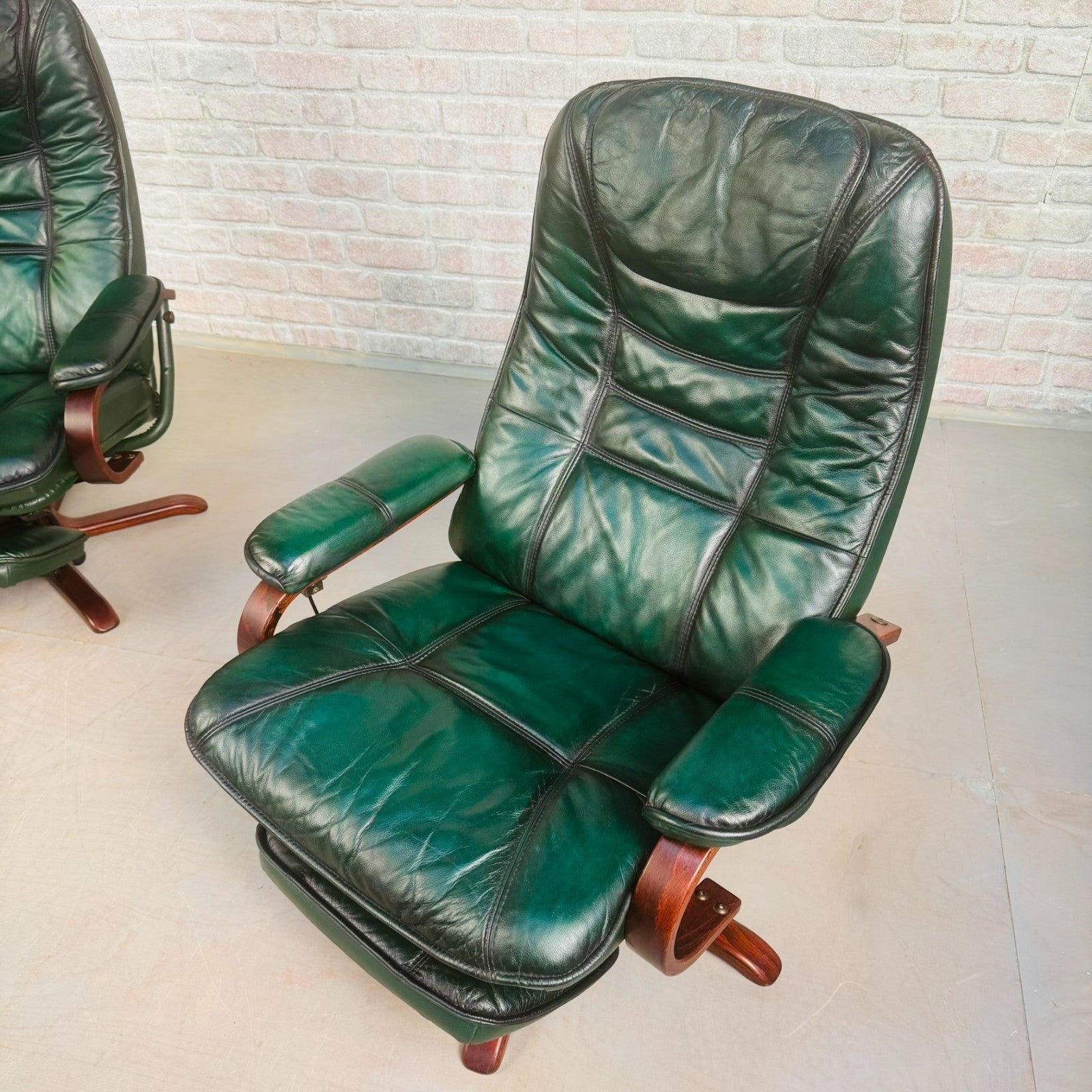 Vintage Pair of Norwegian Green Leather Reclining Swivel Chairs with Footstools