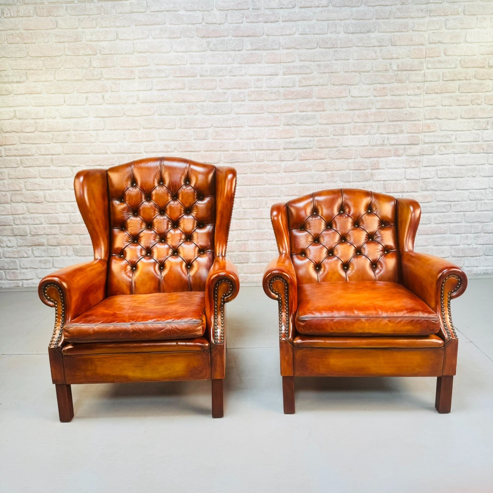Vintage Pair of Danish Tan Leather Wingback Chairs