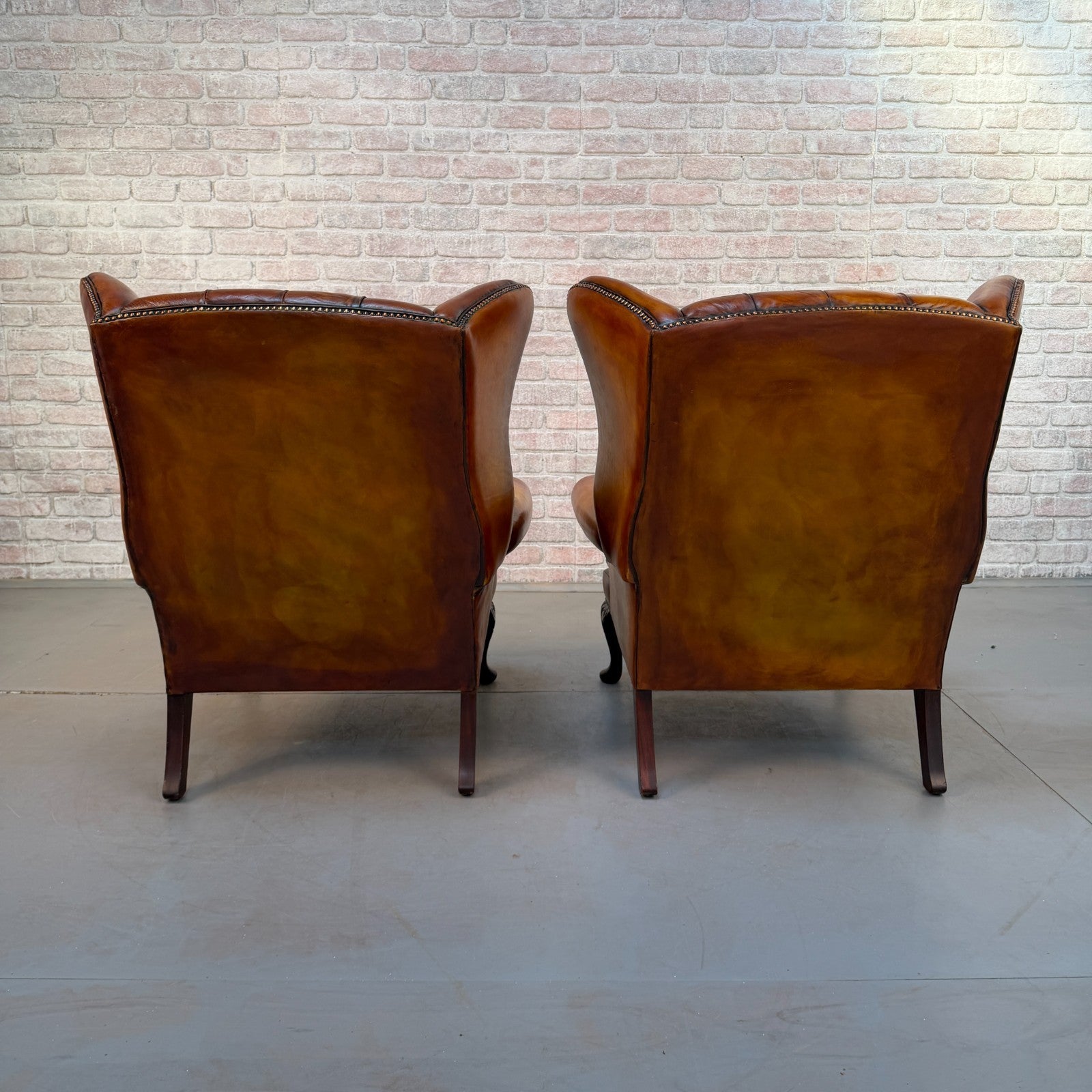 Pair of Vintage English Chesterfield Tan Hand-Dyed Leather Wingback Armchairs