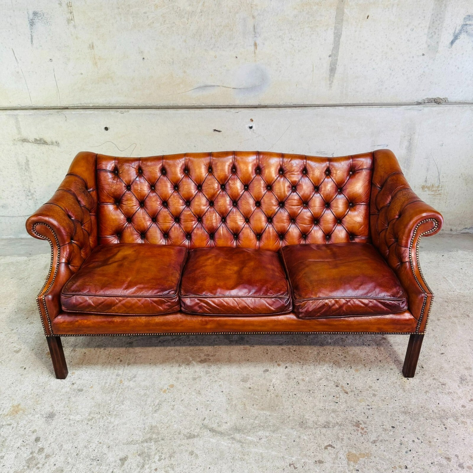 Mid-Century English Gainsborough Cognac Leather Chesterfield Three-Seater Sofa