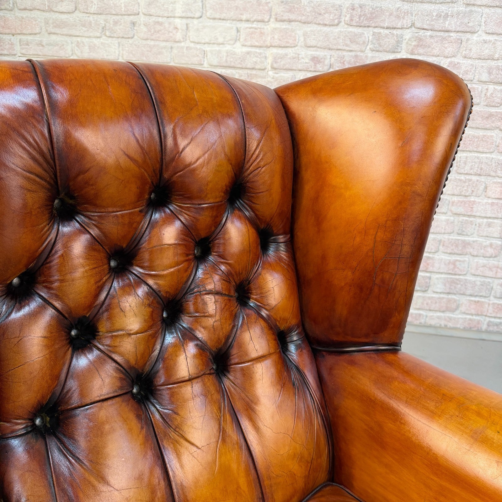 Pair of Vintage English Chesterfield Tan Hand-Dyed Leather Wingback Armchairs