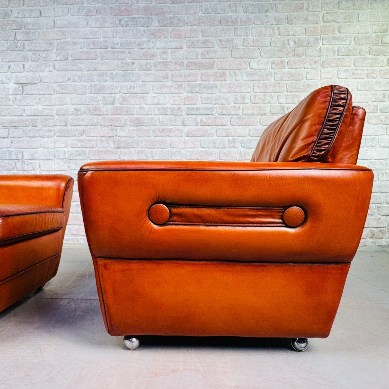 Pair of Elegant Danish Tan Leather Lounge Chairs