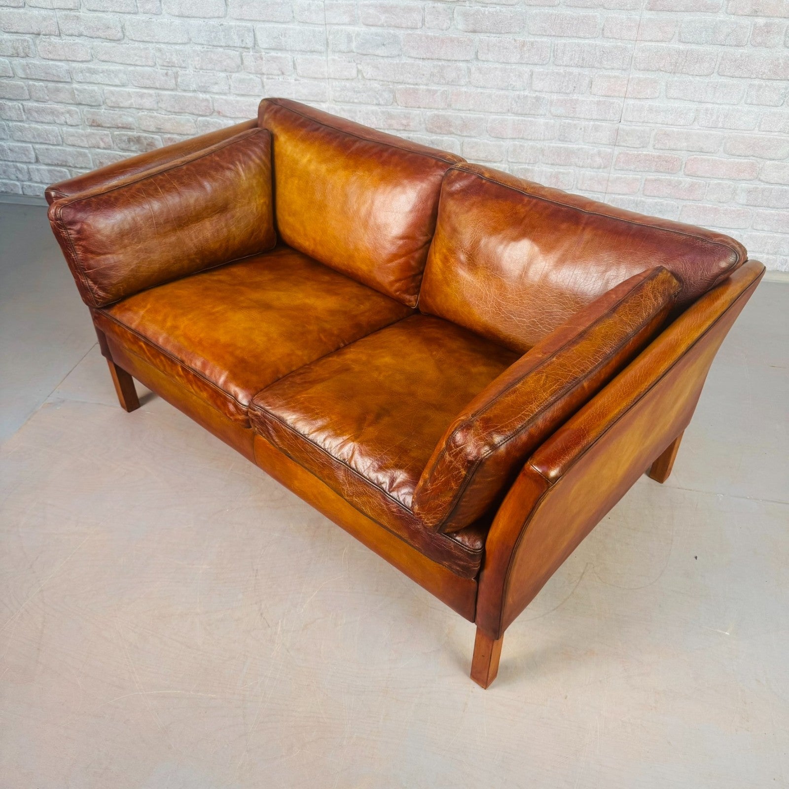 Vintage Stouby Tan Two-Seater Sofa Danish Buffalo Leather Feather Cushions