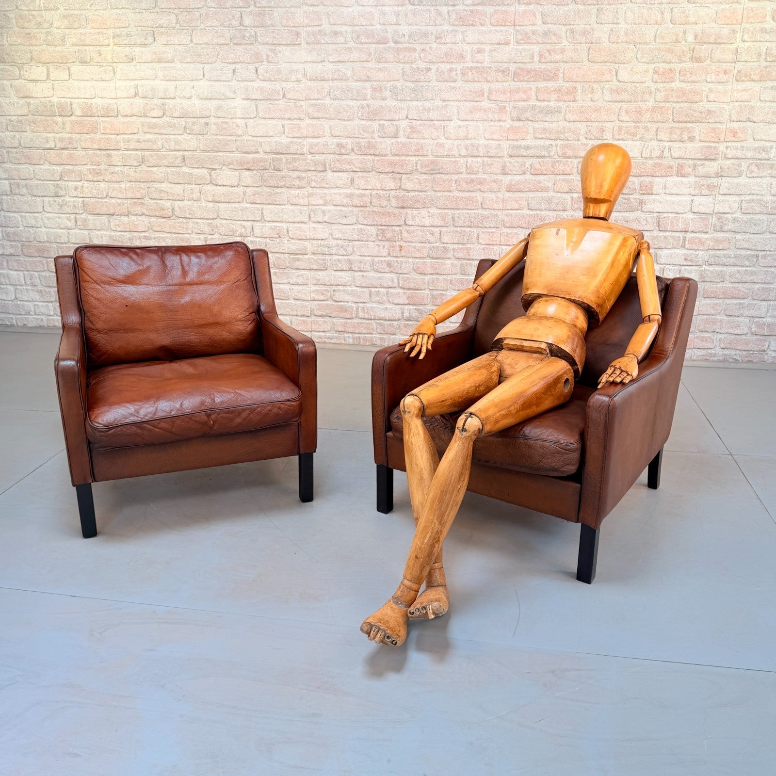 Vintage Near Pair Danish Tan Leather Armchairs Hand Dyed Feather Cushions