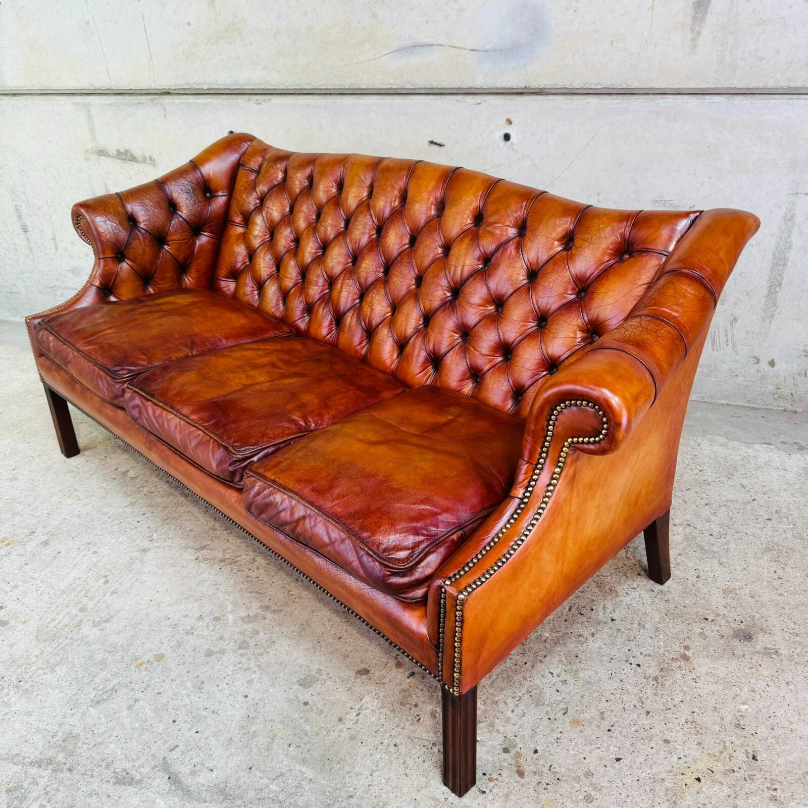 Mid-Century English Gainsborough Cognac Leather Chesterfield Three-Seater Sofa