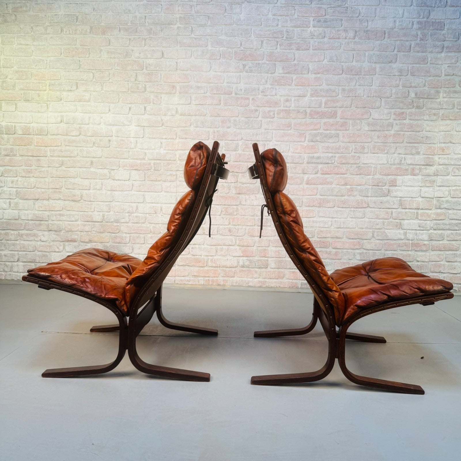 Pair of 1970s Westnofa Siesta High Back Lounge Chairs by Ingmar Relling