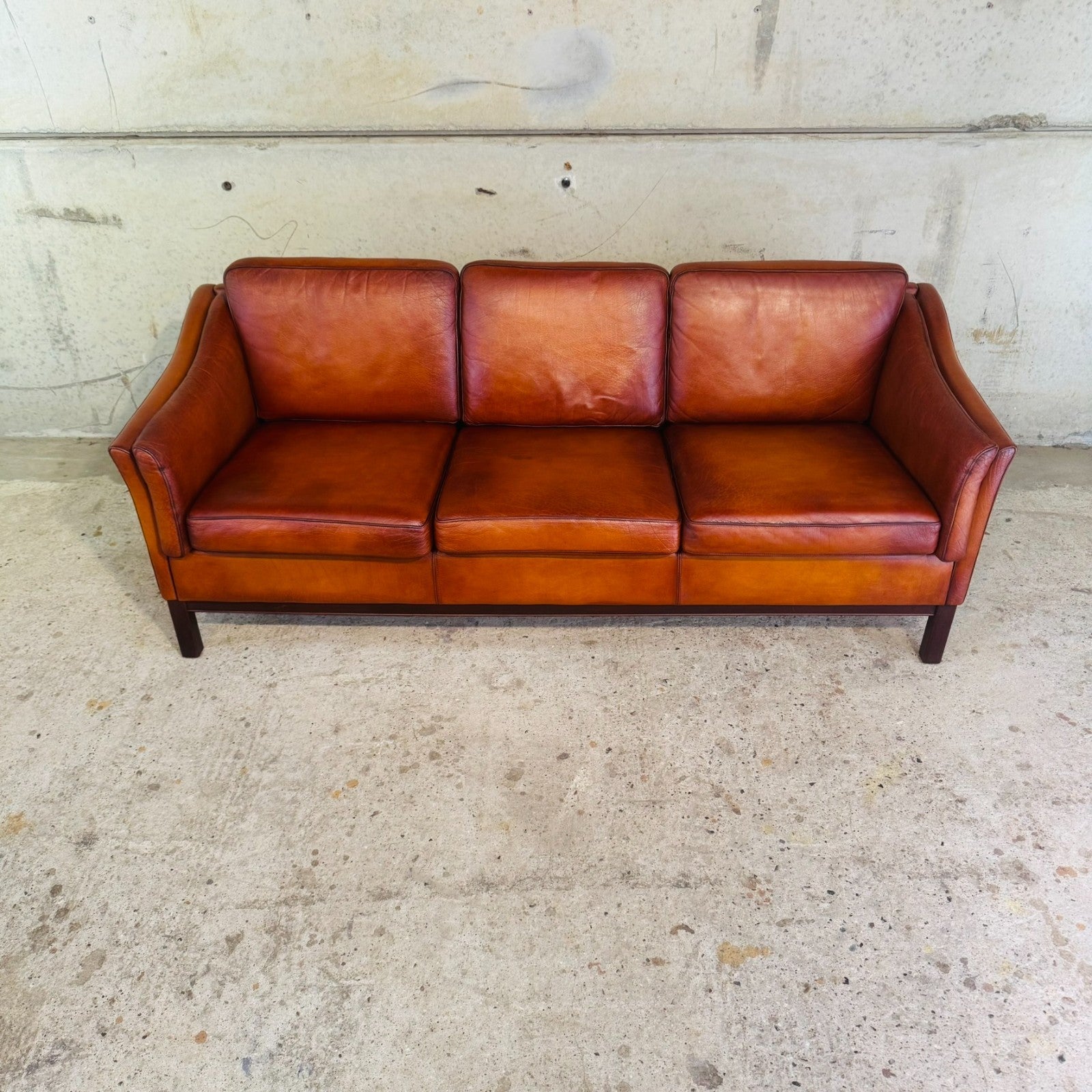 1970s Danish Cognac Leather 3 Seater Sofa — Curved Arms & Beech Plinth