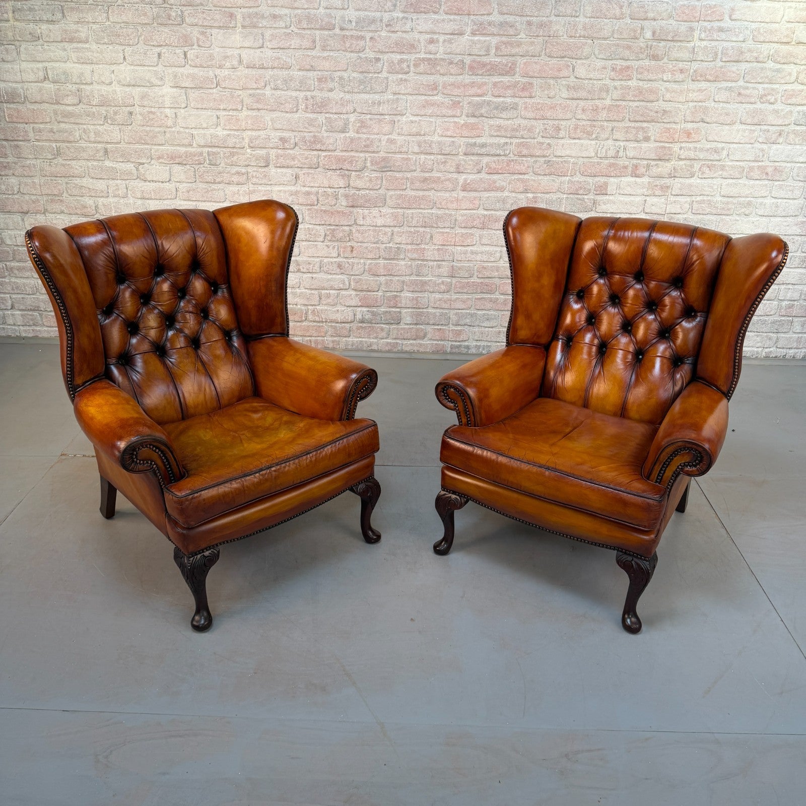 Pair of Vintage English Chesterfield Tan Hand-Dyed Leather Wingback Armchairs