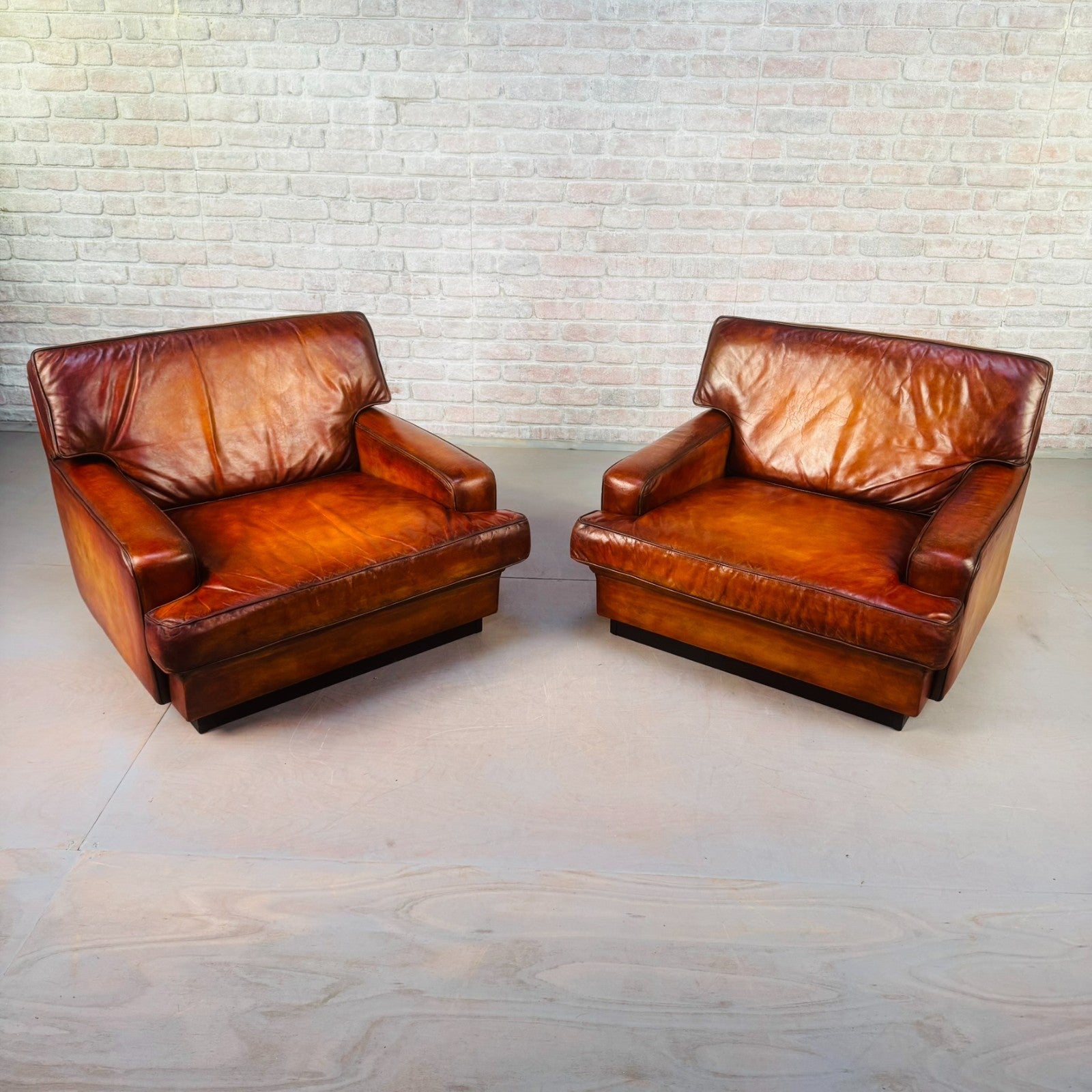 Pair of Arne Norell Swedish Tan Leather Lounge Chairs