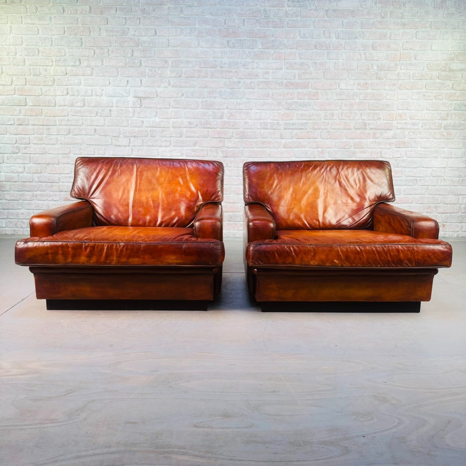 Pair of Arne Norell Swedish Tan Leather Lounge Chairs