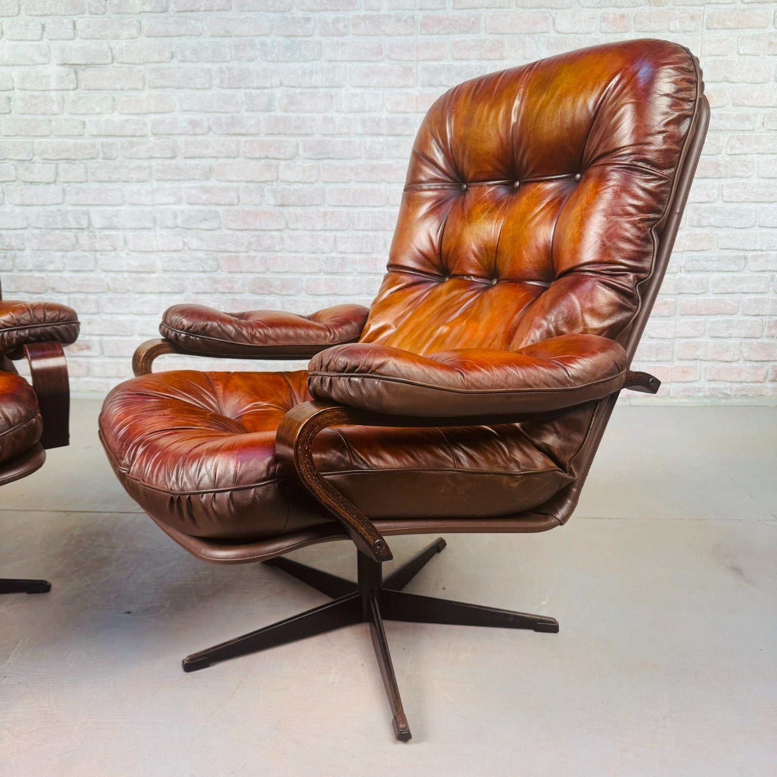 Pair of Vintage Danish Tan Leather Swivel Chairs  Stylish