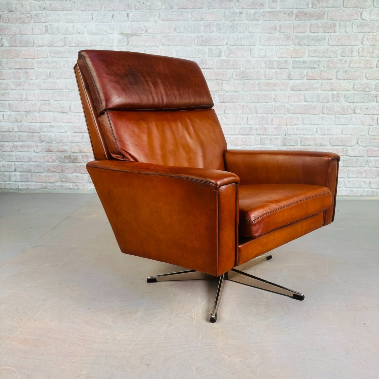 Vintage Danish Tan Leather Swivel Armchair