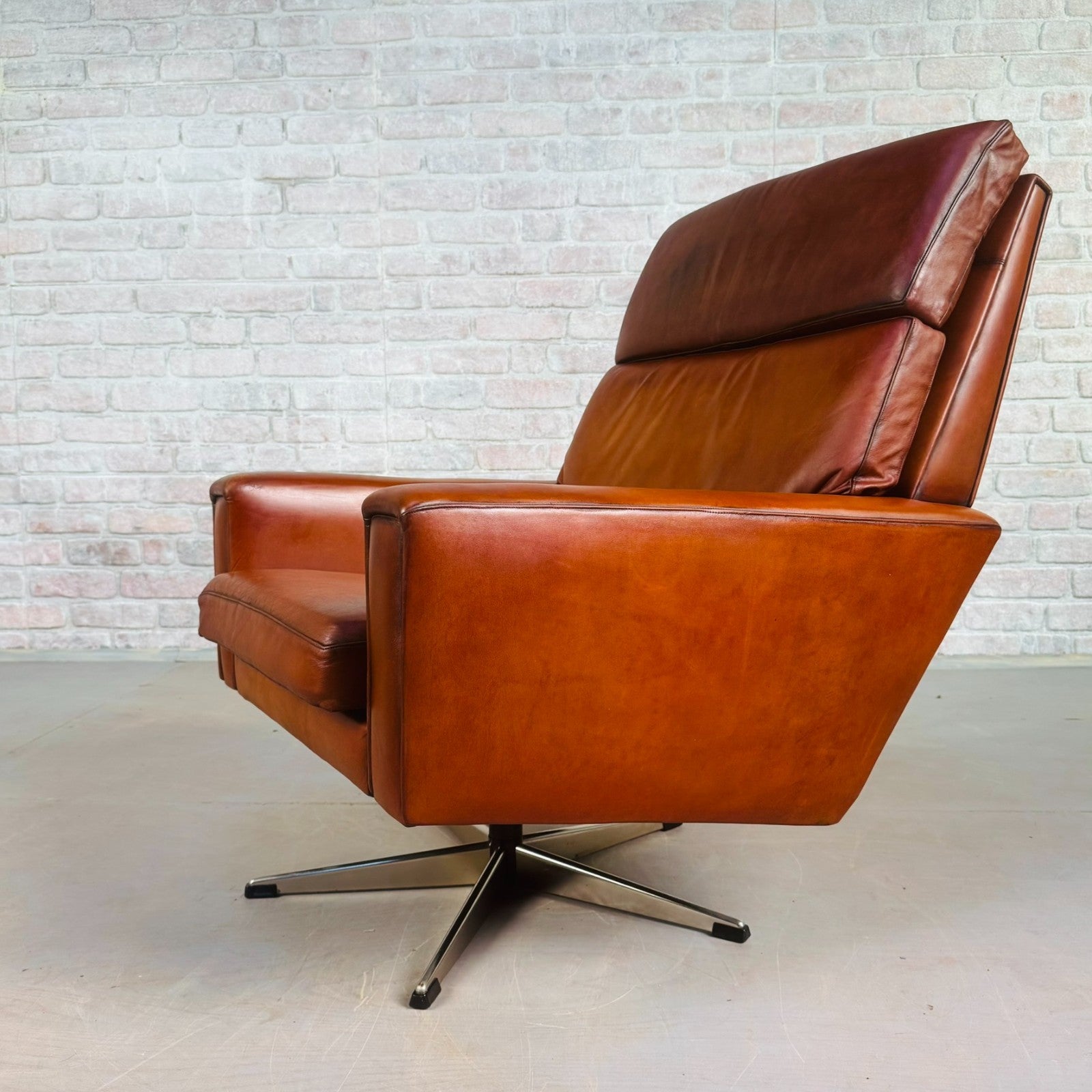 Vintage Danish Tan Leather Swivel Armchair