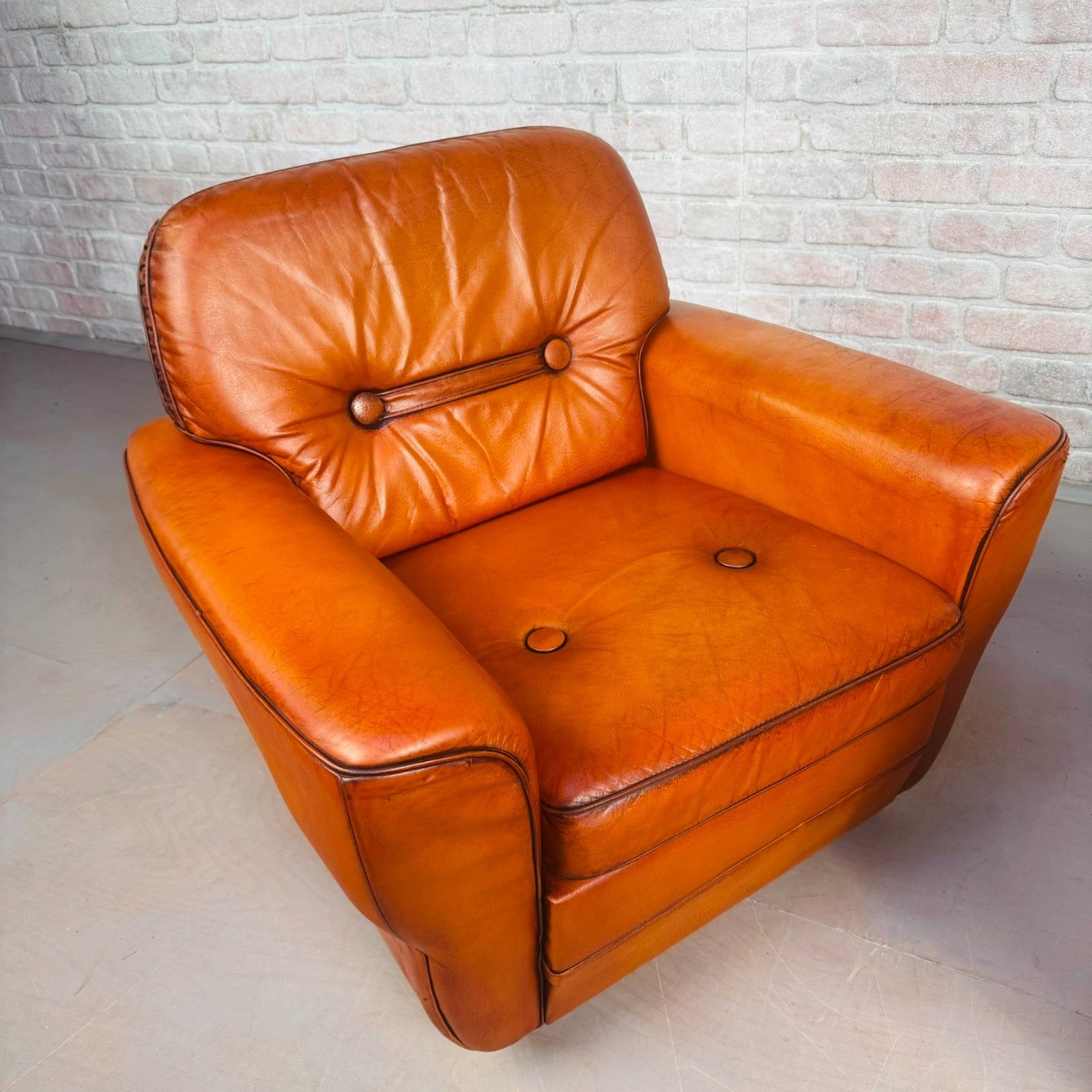 Pair of Elegant Danish Tan Leather Lounge Chairs