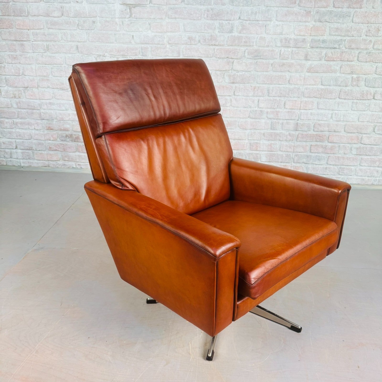 Vintage Danish Tan Leather Swivel Armchair