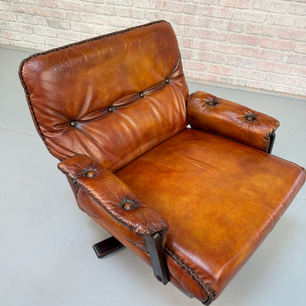Vintage 1970s Arne Norell Swedish Tan Leather Swivel Chair & Footstool