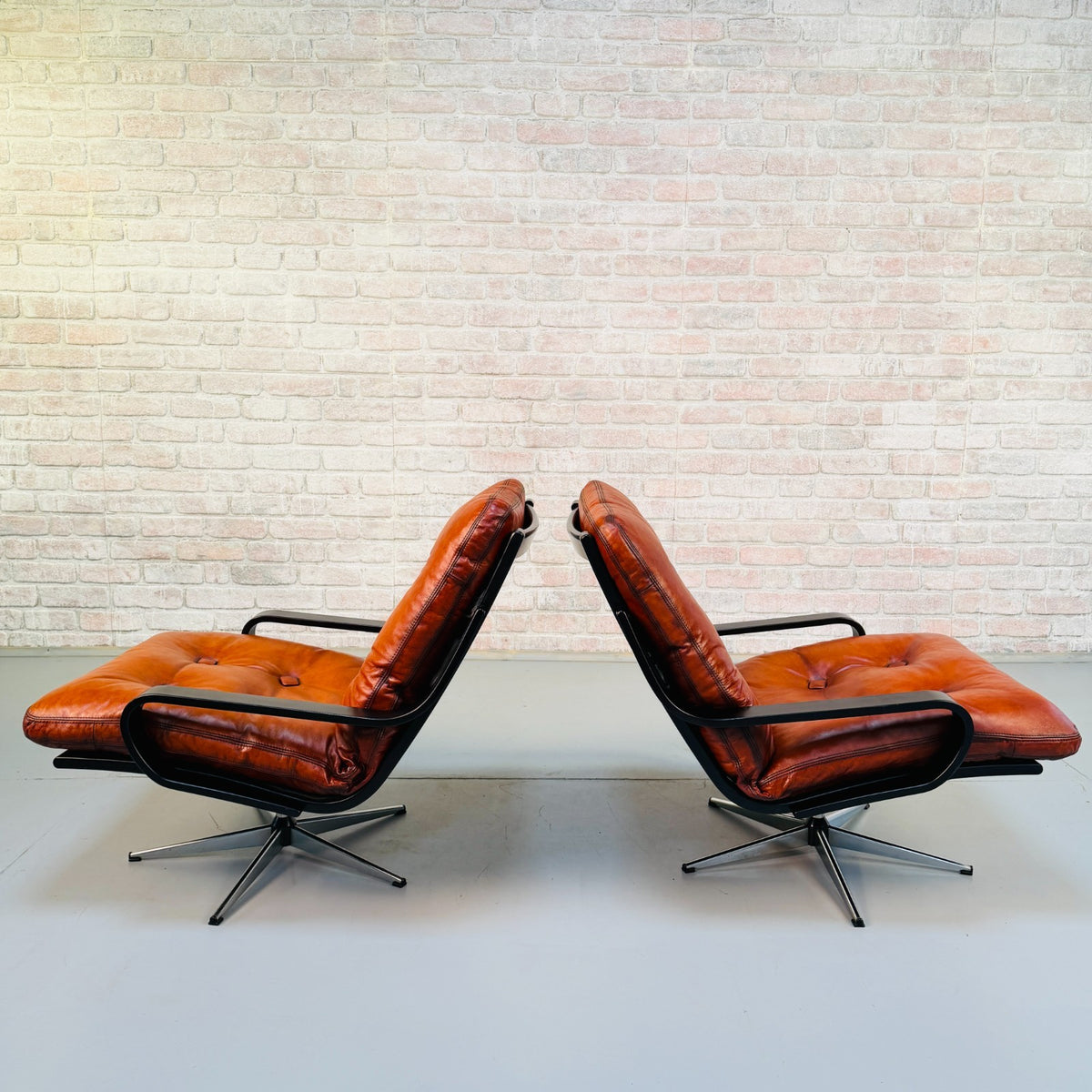 Pair Vintage Danish Cognac Tan Leather Swivel Armchairs Black Beech Frames