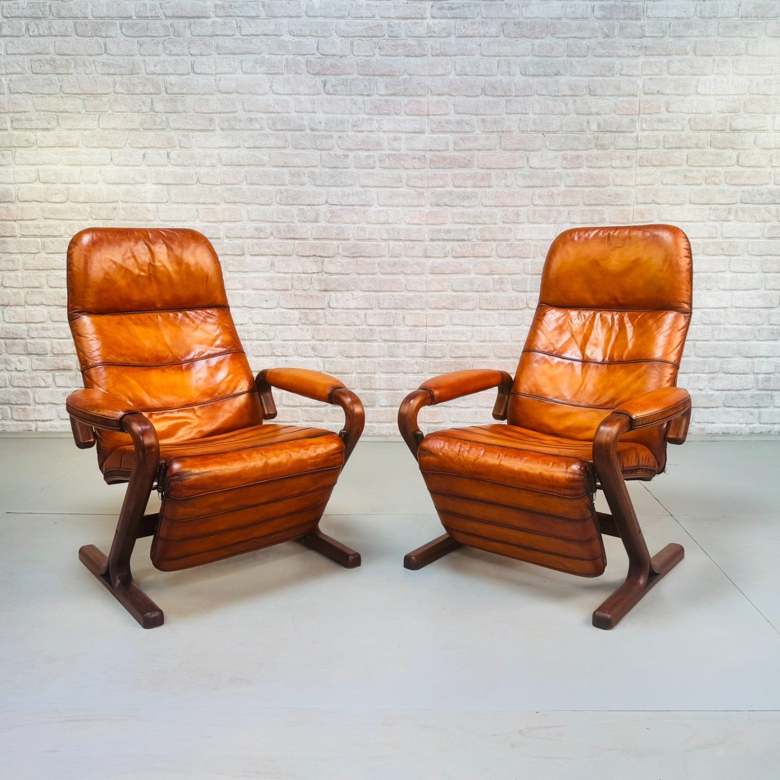Pair of Vintage Danish Zero Gravity Reclining Tan Leather Armchairs Teak Frame