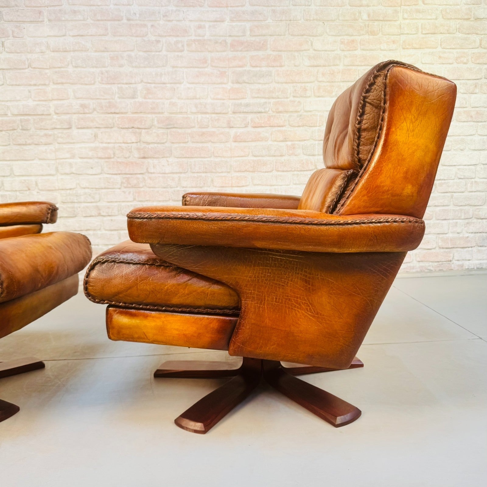 Pair Danish Swivel Chairs Tan Bison Leather Hand Plaited Lounge Chairs