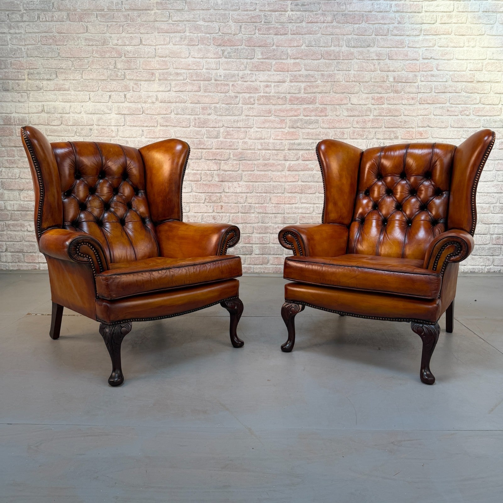 Pair of Vintage English Chesterfield Tan Hand-Dyed Leather Wingback Armchairs