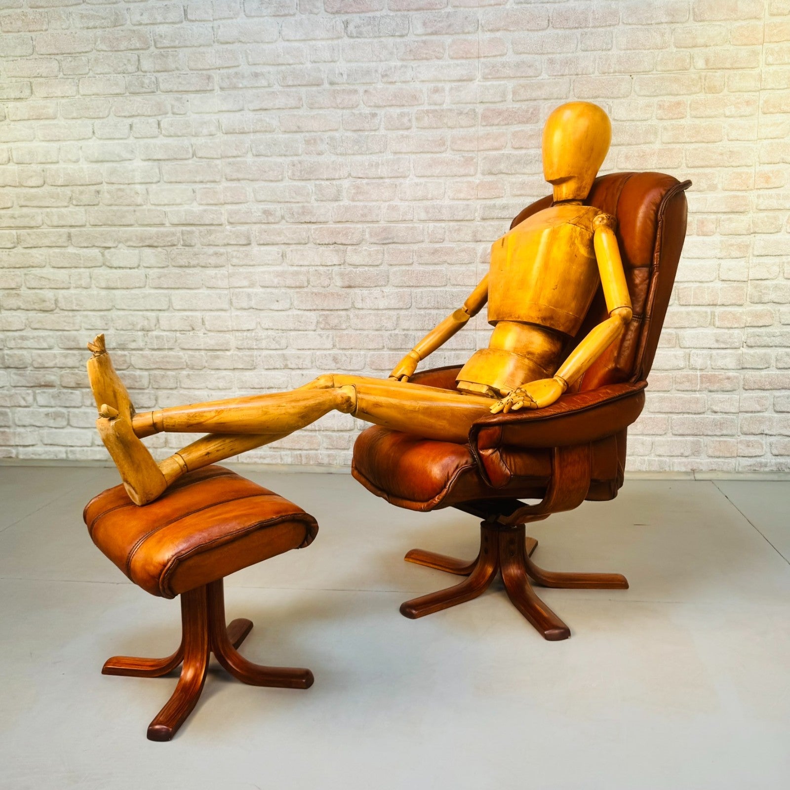 Vintage Danish Reclining Swivel Chair & Footstool | Hand Dyed Tan Leather