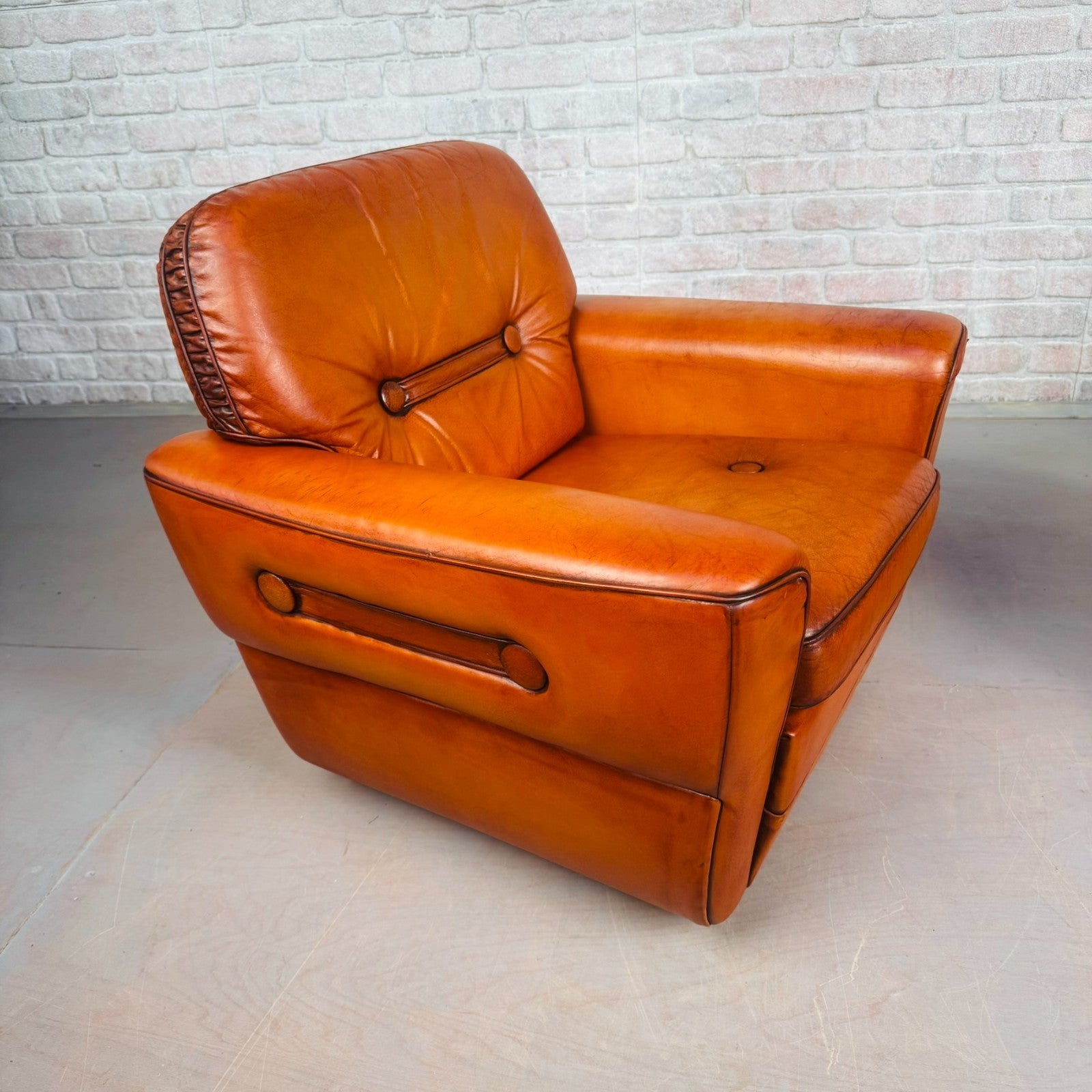 Pair of Elegant Danish Tan Leather Lounge Chairs