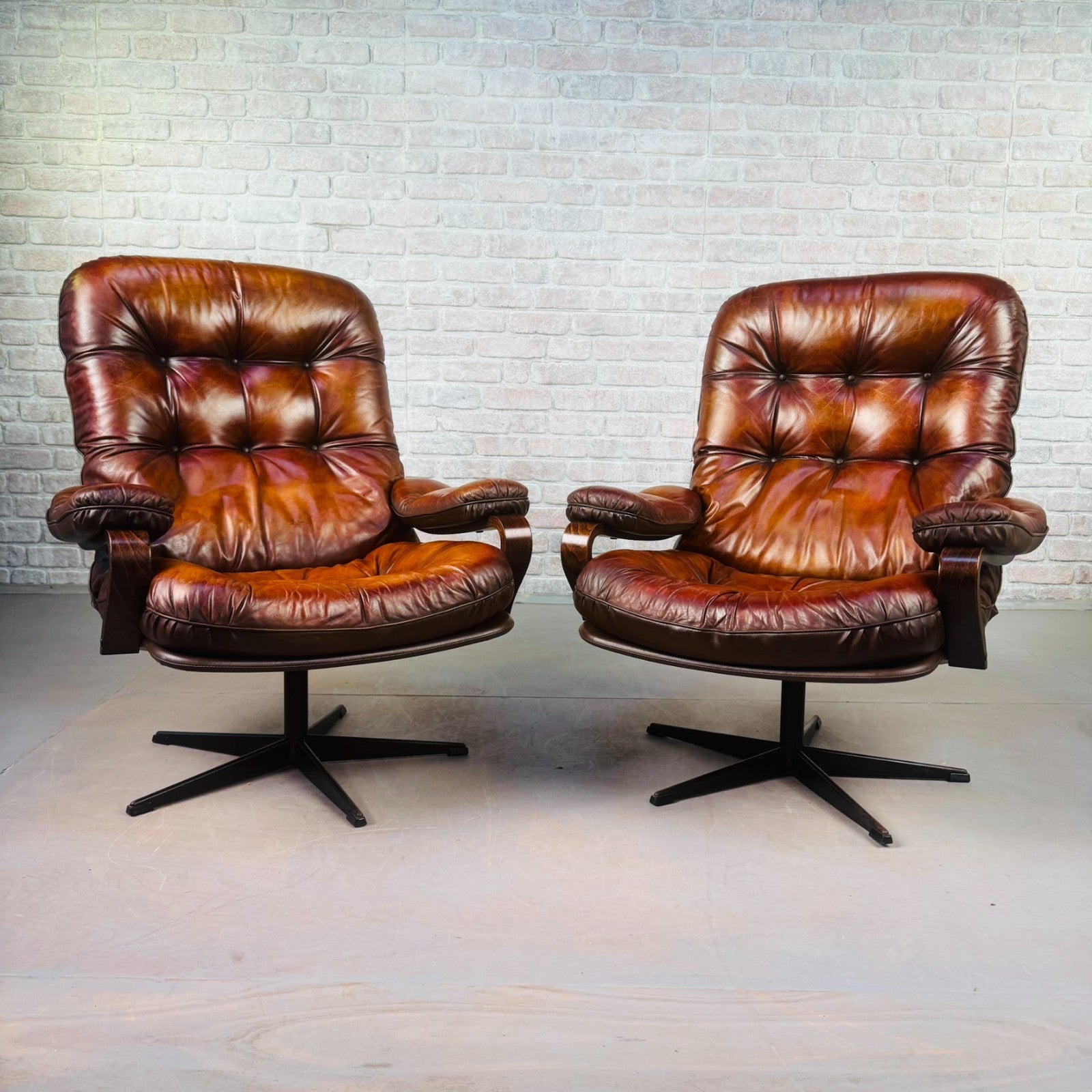 Pair of Vintage Danish Tan Leather Swivel Chairs  Stylish