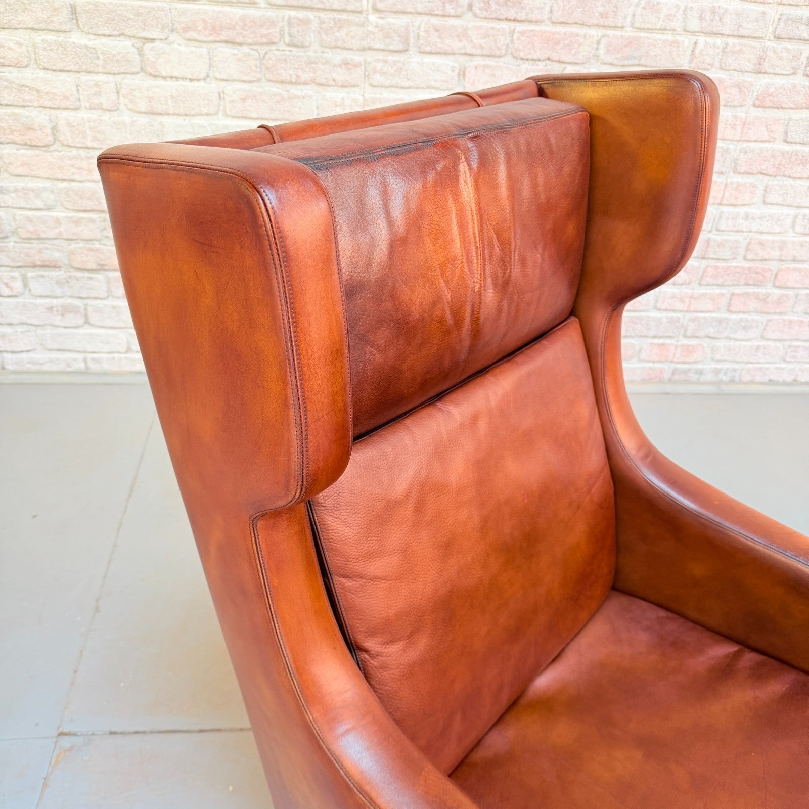 Vintage 1970s His & Hers Danish Tan Leather Armchairs Solid Oak Base Pair