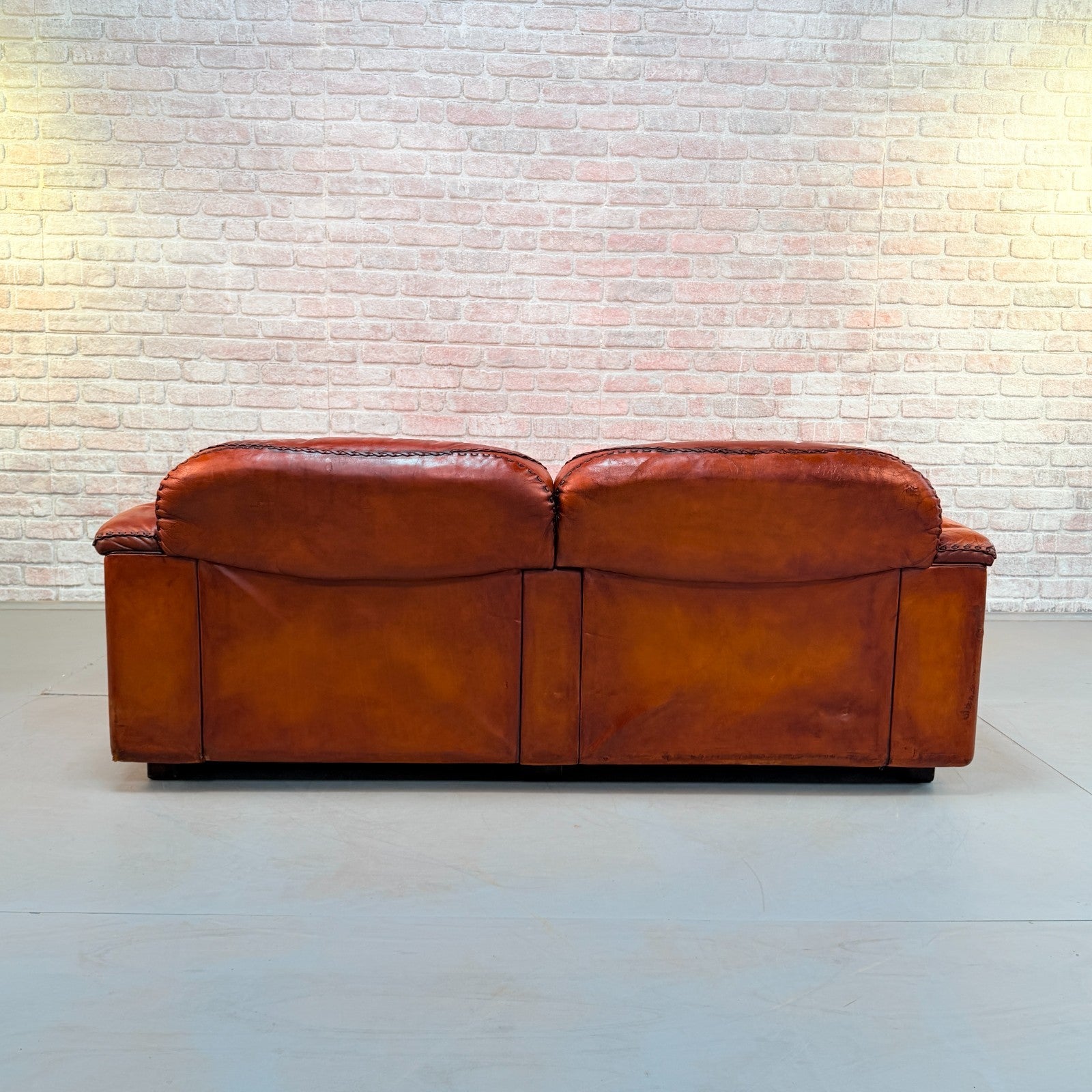 Vintage 70s De Sede DS-101 Two Seater Sofa & Footstool Cognac Leather Switzerlan