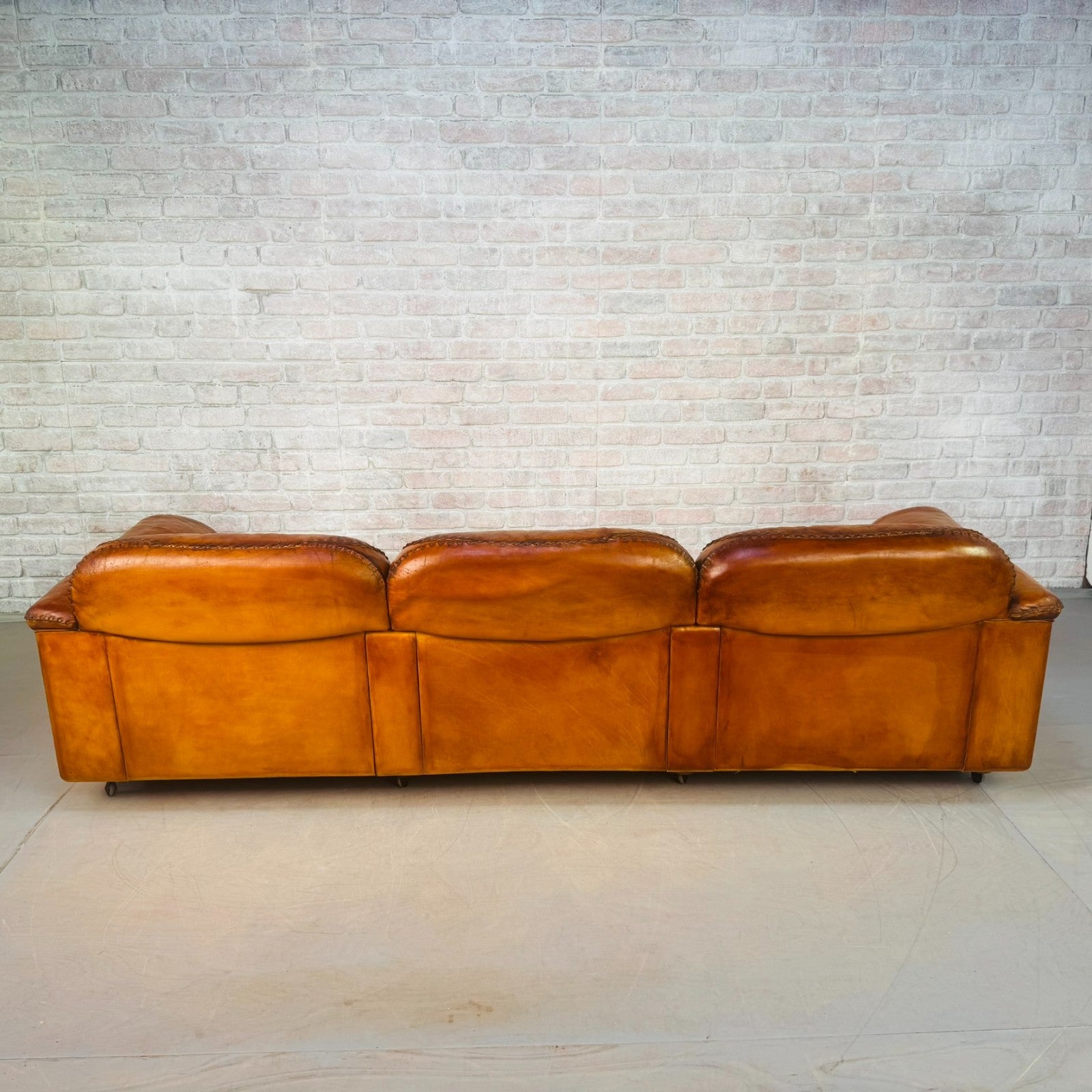 1970s Swiss De Sede DS-101 Tan Leather Three Seater & Armchair Suite