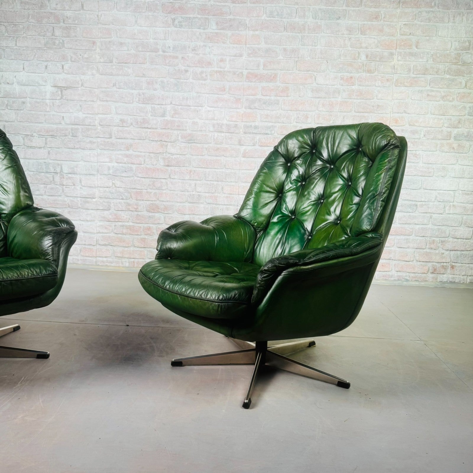 Pair of Vintage Danish Green Leather Swivel Chairs