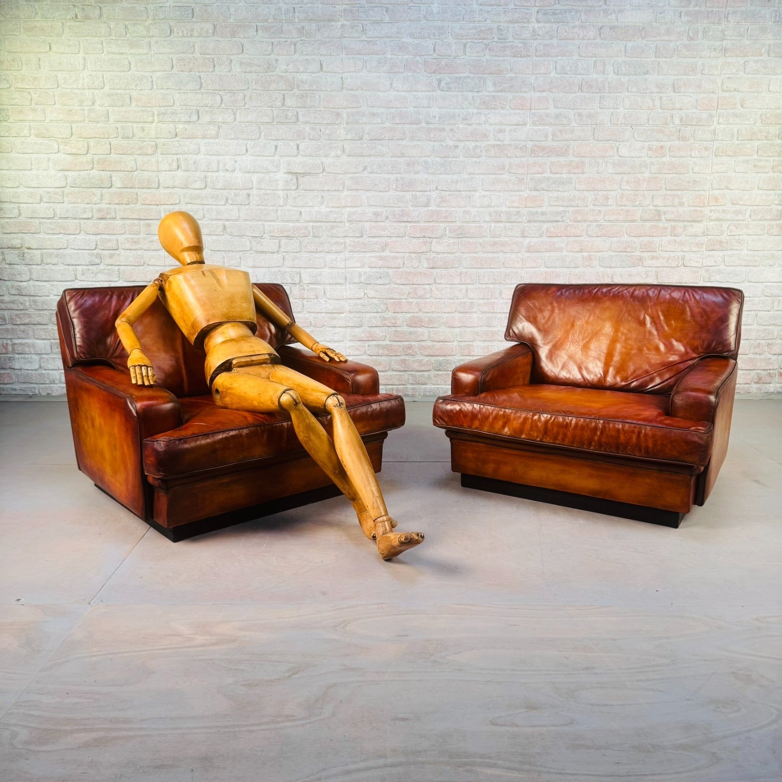 Pair of Arne Norell Swedish Tan Leather Lounge Chairs